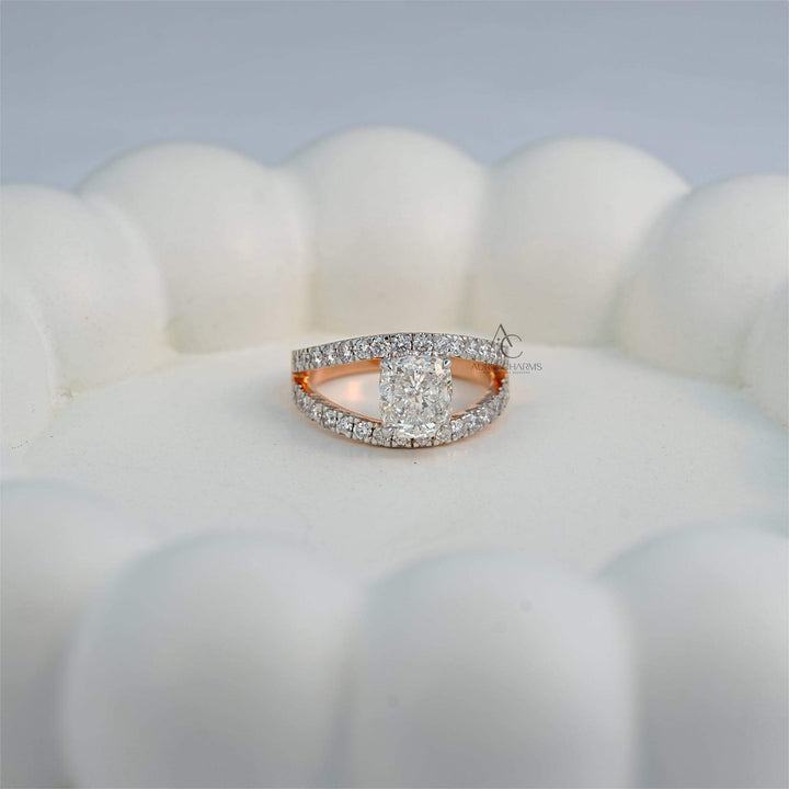 Side angle of a sparkling lab-grown diamond ring on a soft white surface, highlighting intricate craftsmanship.