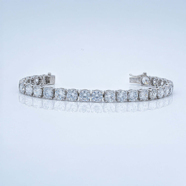 White gold tennis bracelet with round lab-grown diamonds in prong setting.