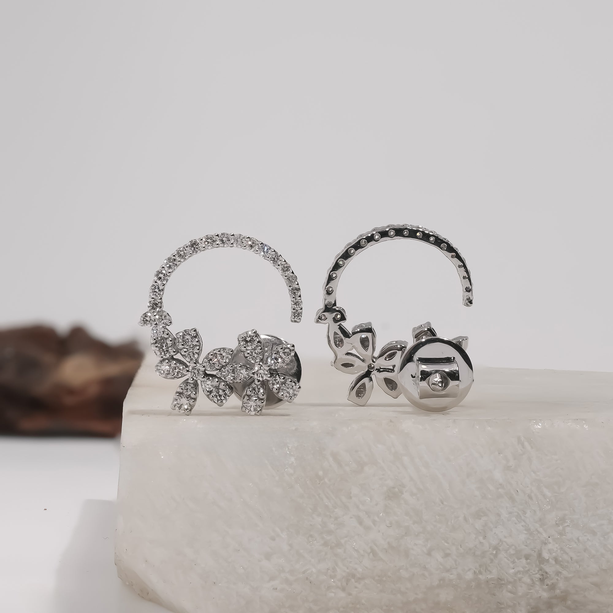 Stunning Rosalie Floral lab-grown diamond hoop earrings in silver, echoing delicate blossoms for an ethical luxury gift.