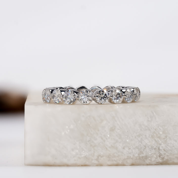 Elegant diamond eternity band with round-cut diamonds set in a sleek white gold band