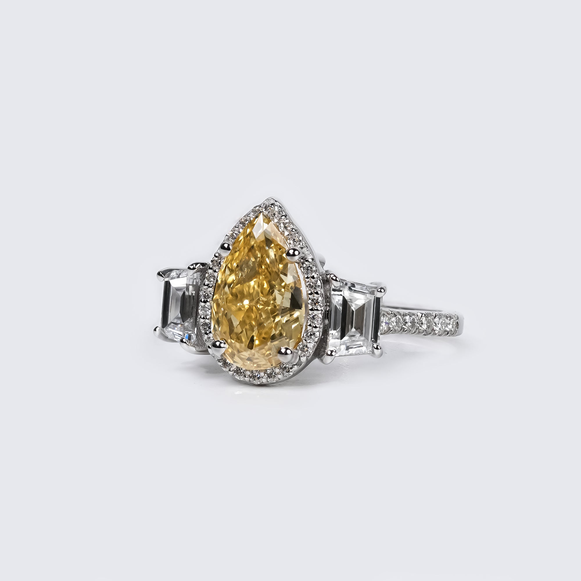 Fancy Yellow Pear Three-Stone Ring