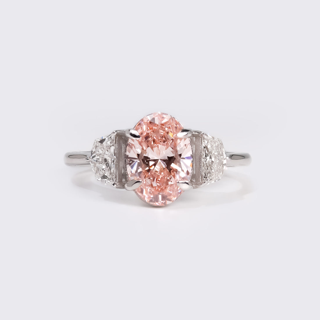 Fancy Pink Oval Three-Stone Ring