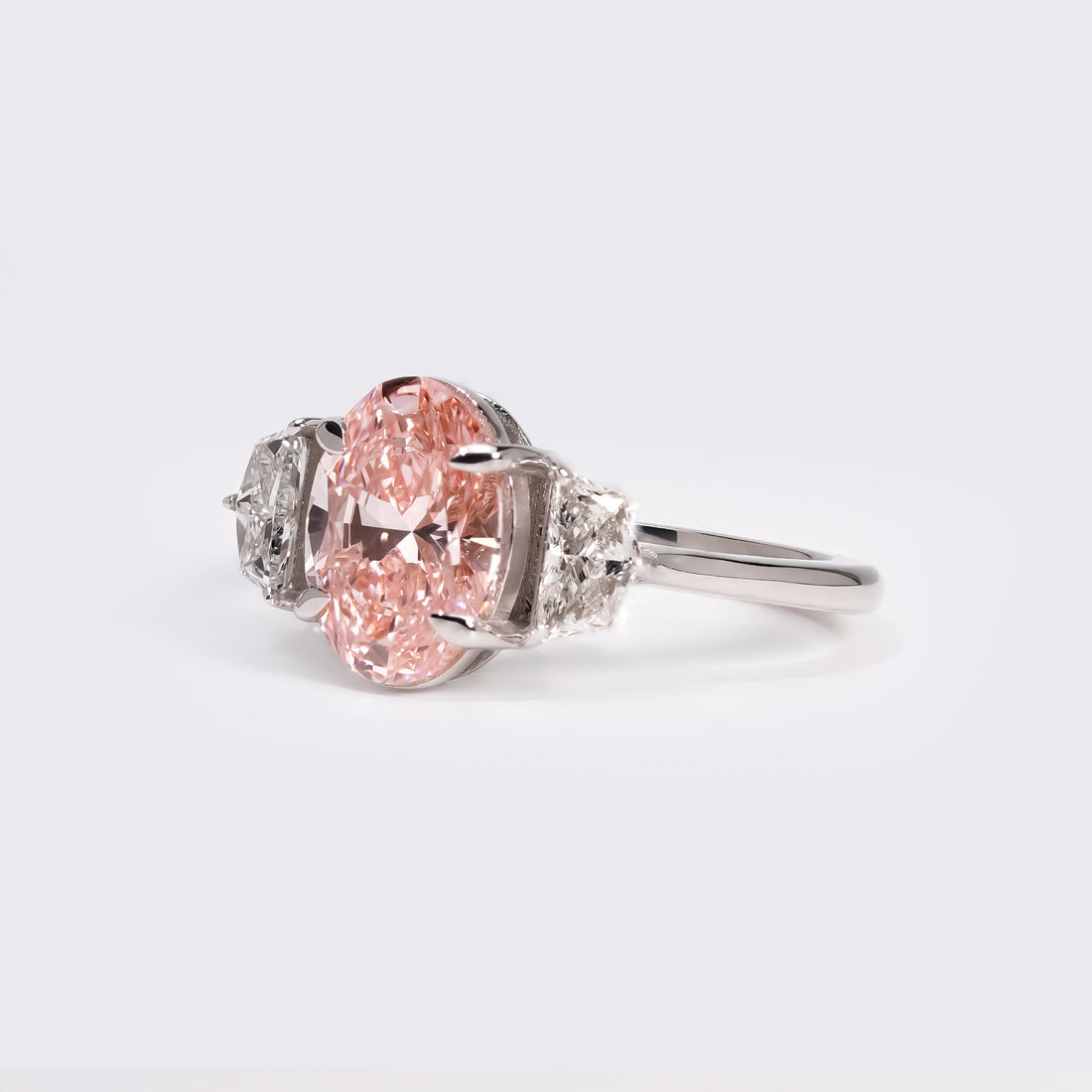 Fancy Pink Oval Three-Stone Ring