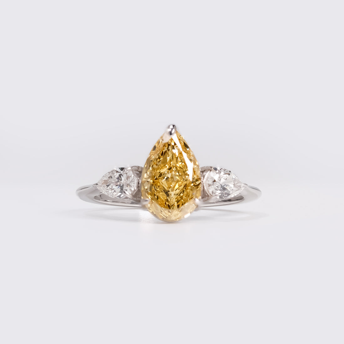 Fancy Yellow Pear Three-Stone Ring