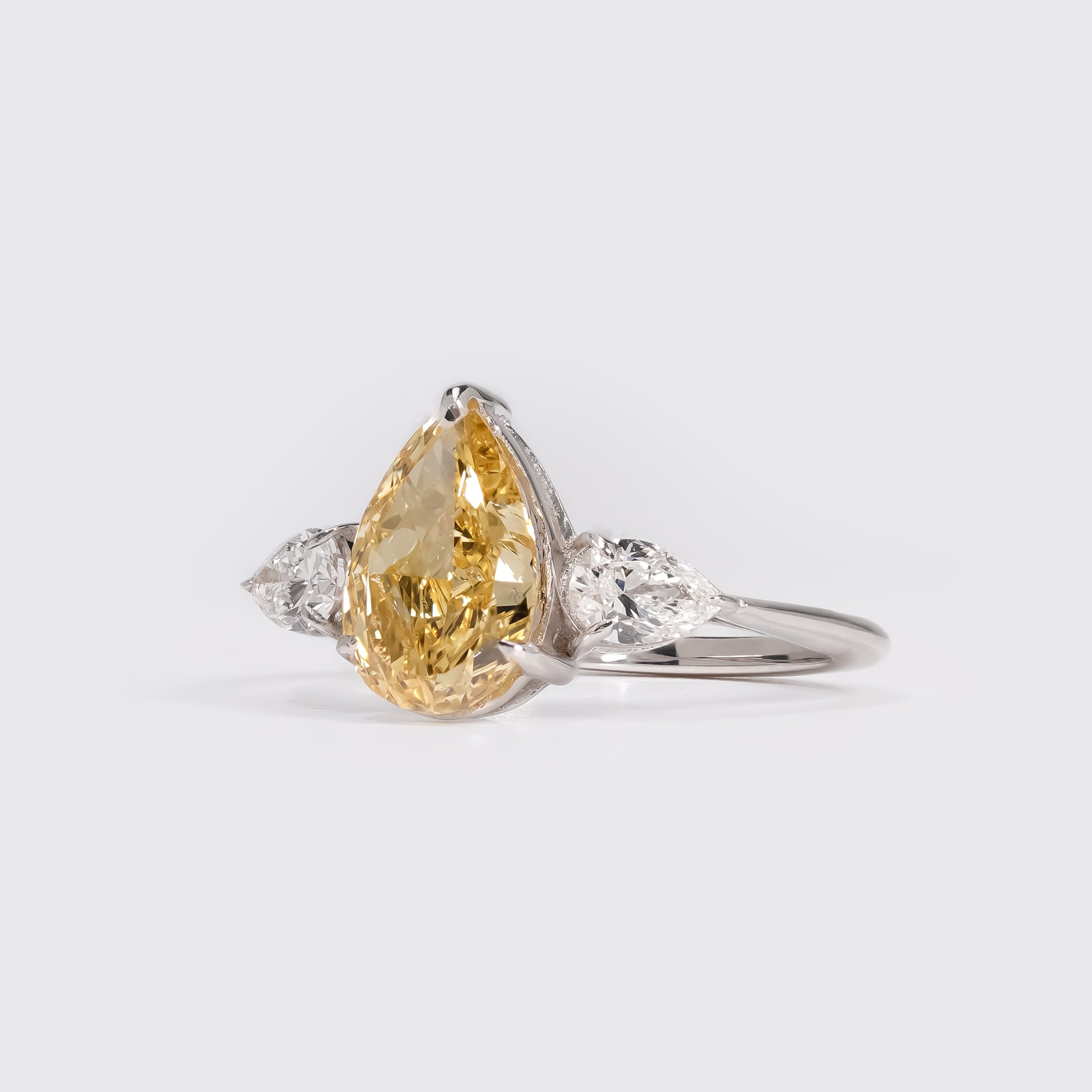 Fancy Yellow Pear Three-Stone Ring
