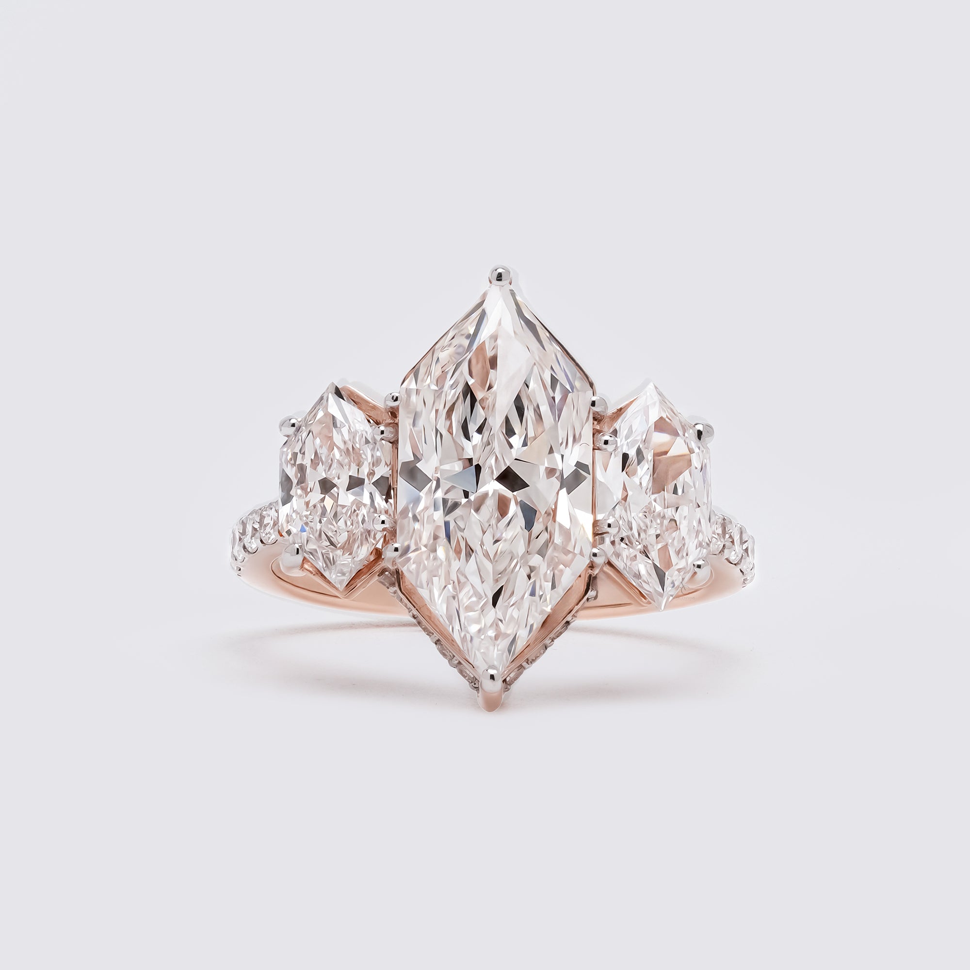 Dutch Marquise Hidden Halo Three-Stone Ring