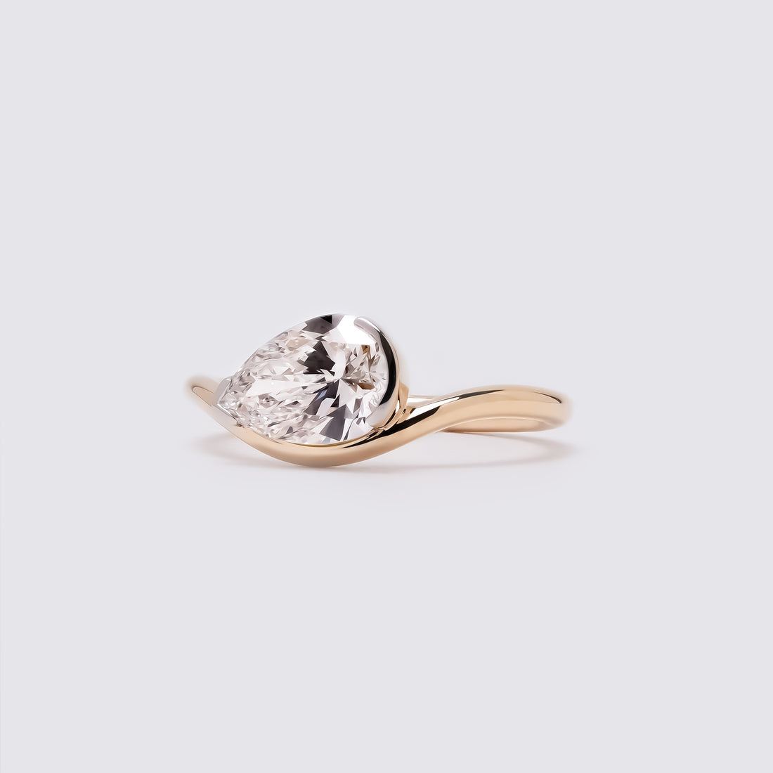 Nadia Pear Curved Solitaire Ring