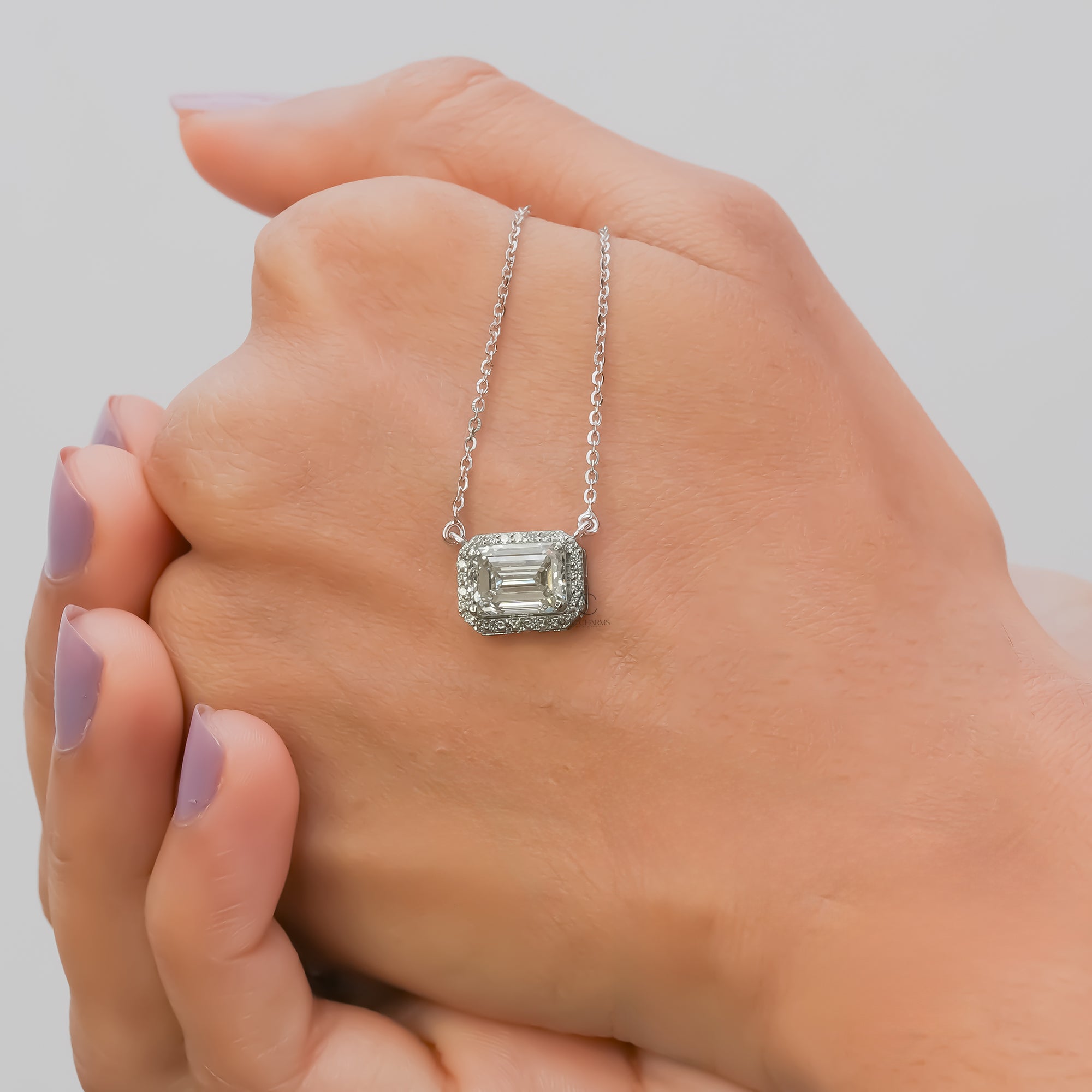 Zendaya Emerald East-West Halo Diamond Pendant