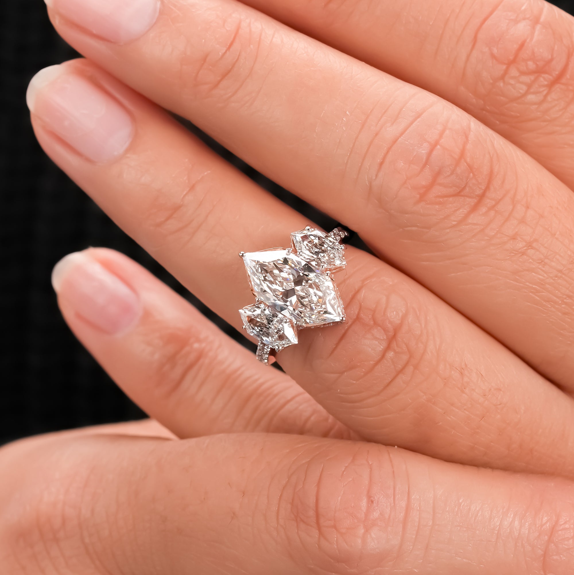 Dutch Marquise Hidden Halo Three-Stone Ring