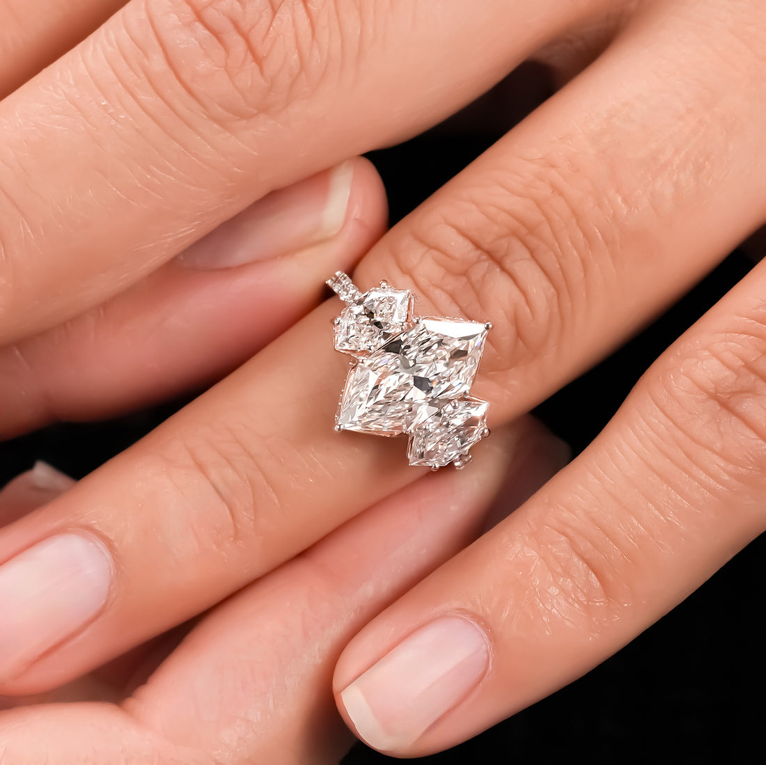 Dutch Marquise Hidden Halo Three-Stone Ring