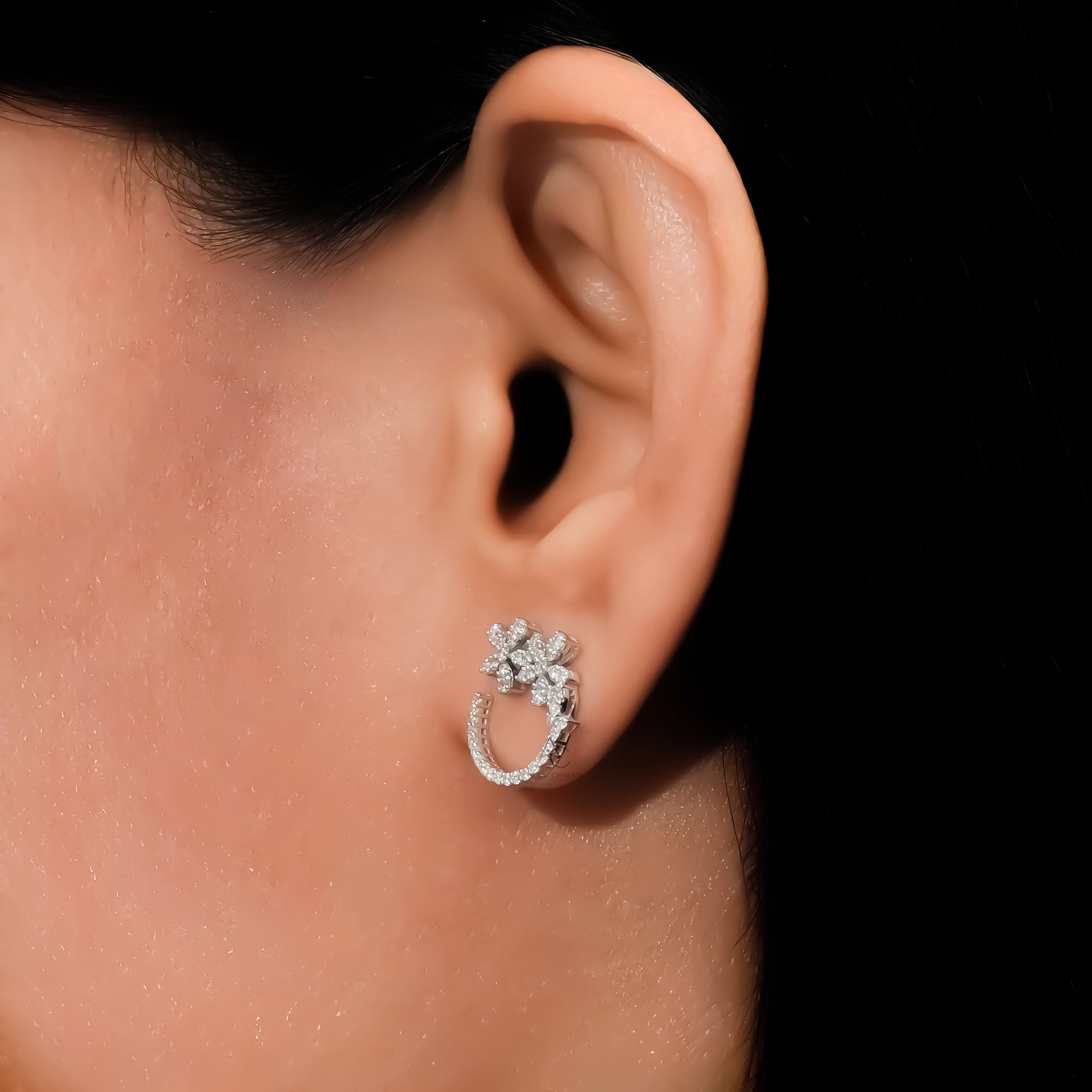 Close-up of the Rosalie Floral Lab Grown Diamond Hoop Earrings, showcasing delicate floral design and sustainable luxury on the ear.
