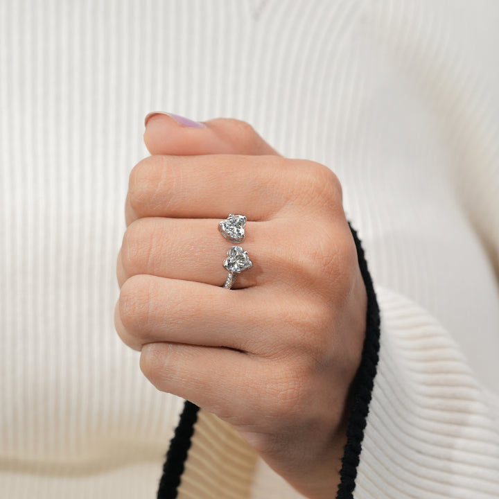 A symbol of love silver ring with two dazzling heart-shaped stones