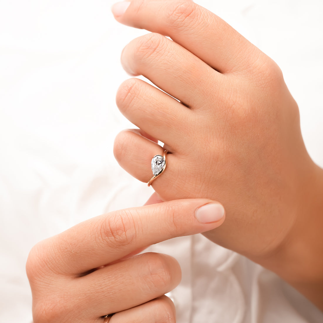 Nadia Pear Curved Solitaire Ring