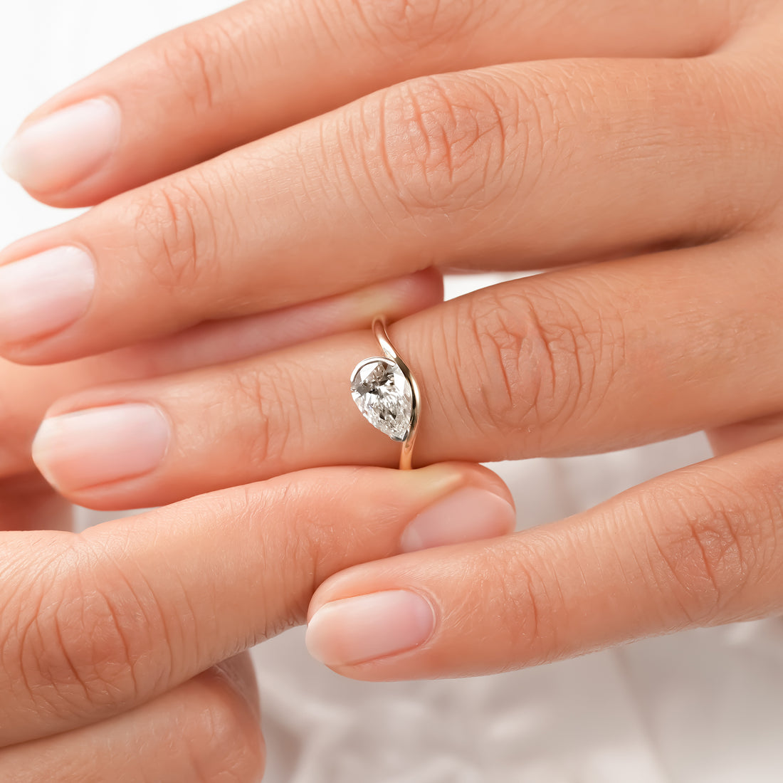 Nadia Pear Curved Solitaire Ring