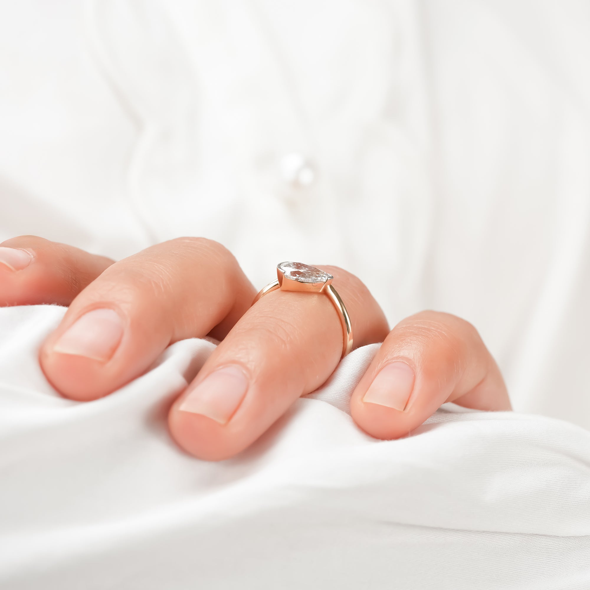 Nadia Pear Curved Solitaire Ring