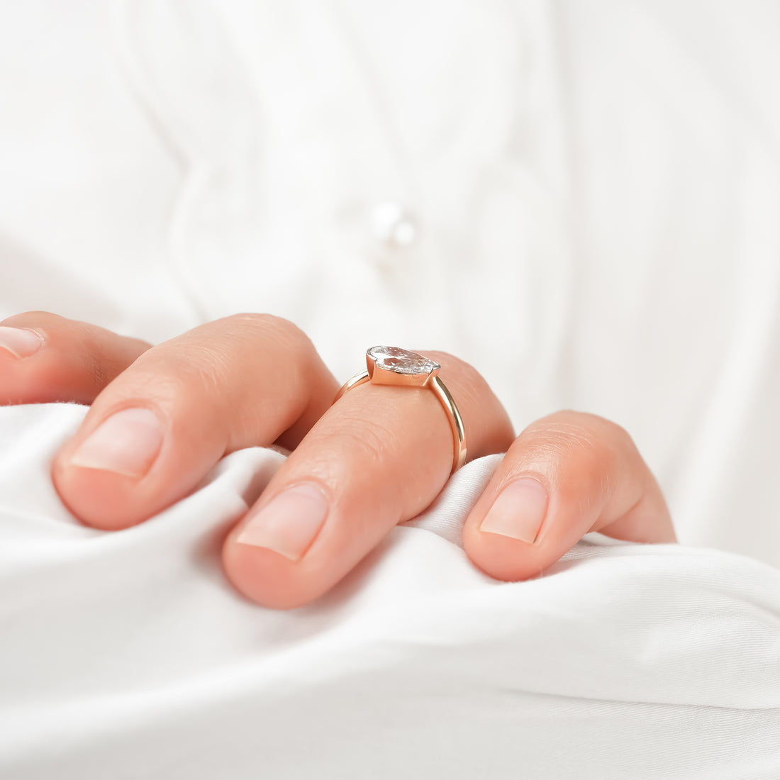 Nadia Pear Curved Solitaire Ring