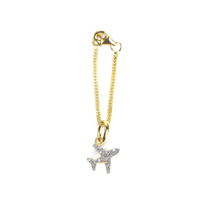 Two-tone bracelet watch styled with a gold chain and diamond airplane charm, adding a subtle, fashionable accent.