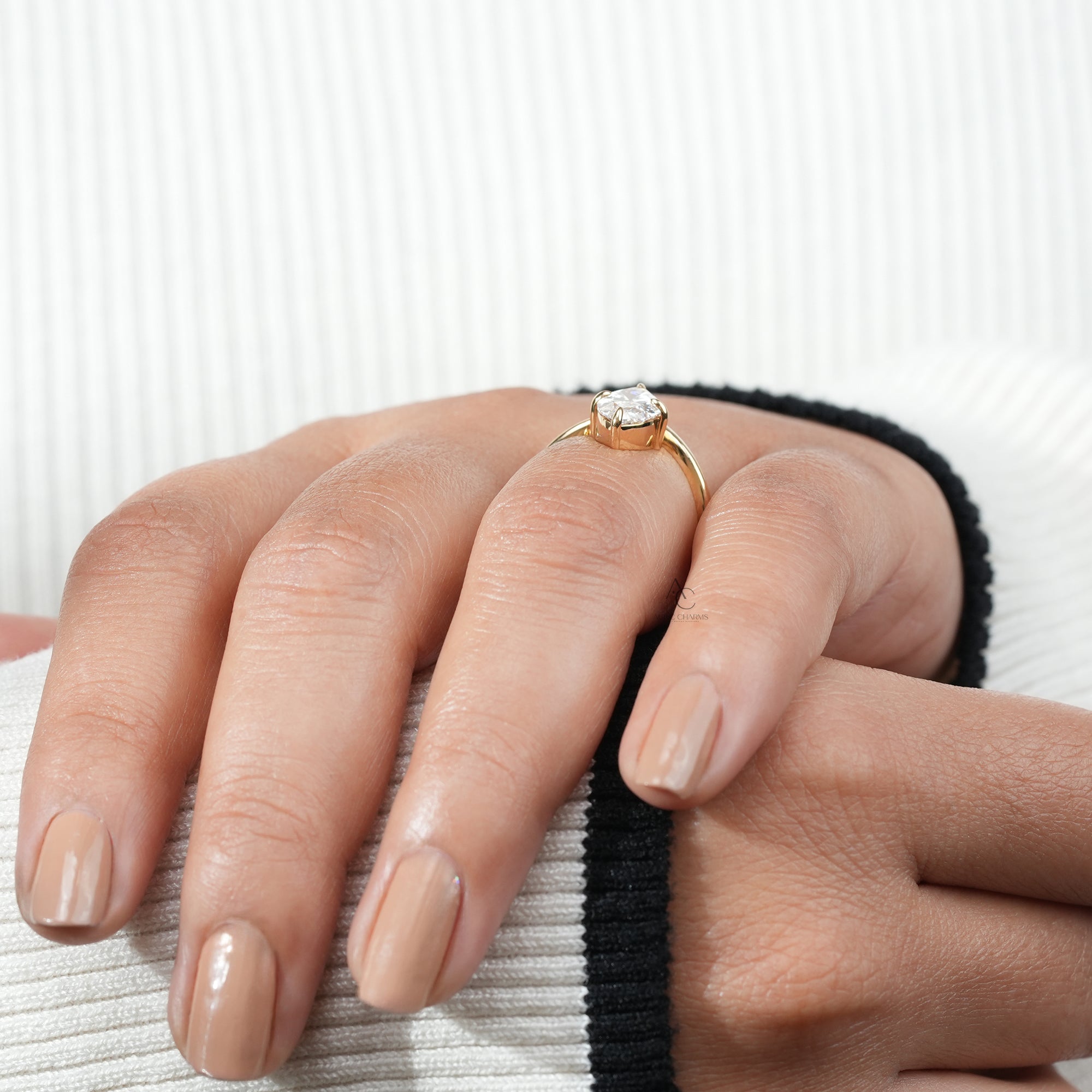 Lyra Marquise Solitaire Lab Grown Diamond Ring worn on hand, featuring a stunning golden arc and minimalist elegance.