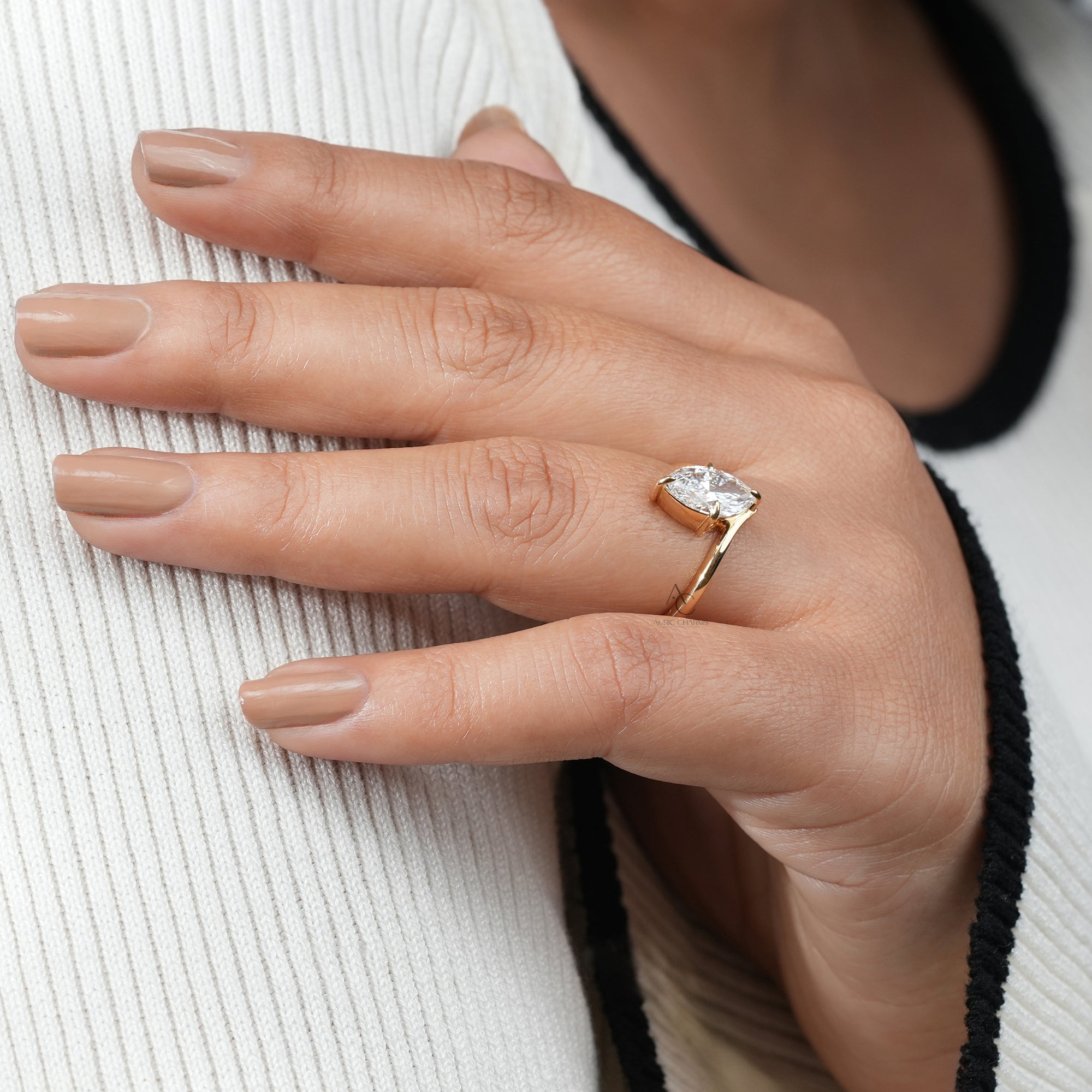 The Lyra marquise solitaire lab-grown diamond ring showcased on a hand, radiating luxury and elegance.