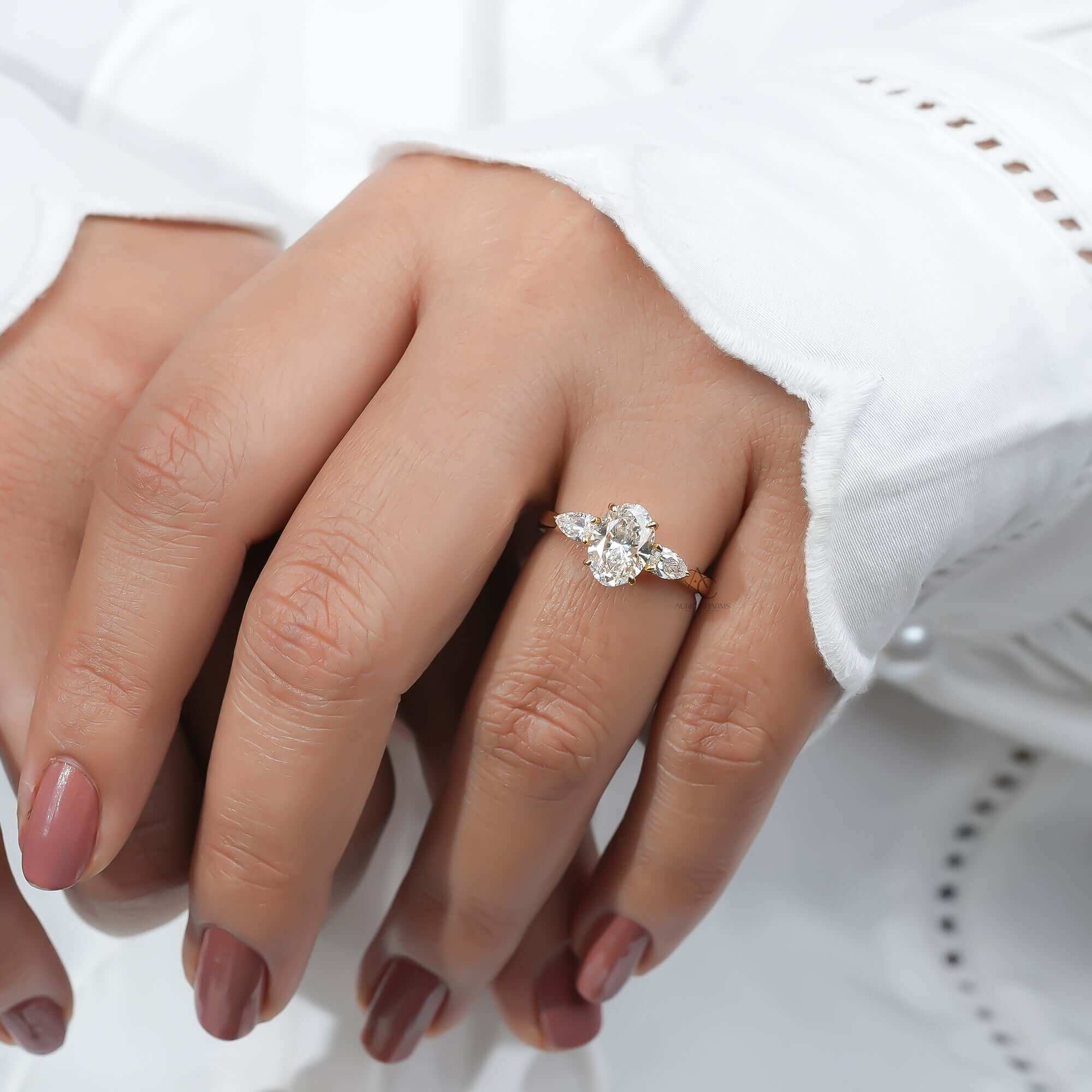 Eterna Oval Diamond Three-Stone Ring