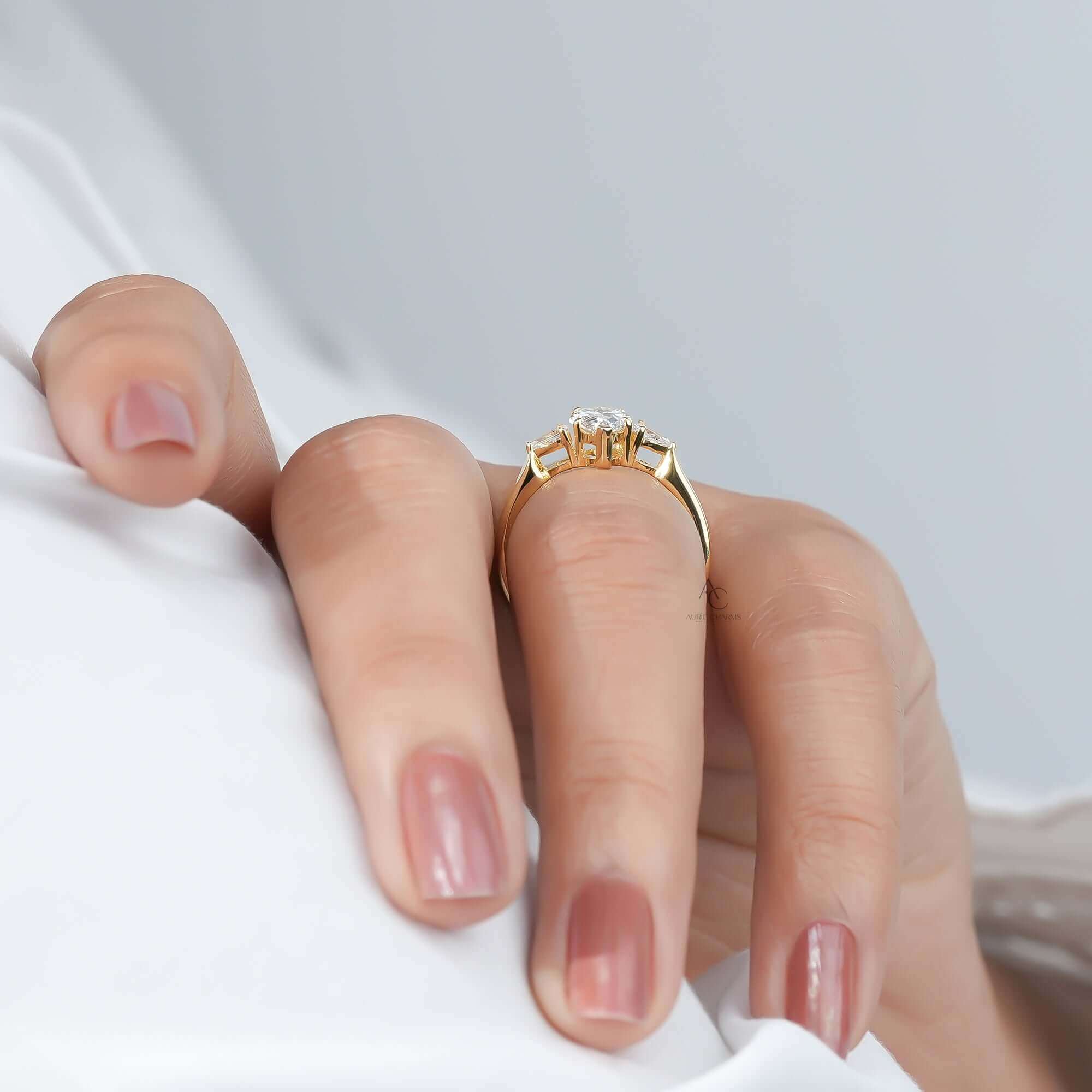 Liora Three-Stone Pear Diamond Ring in Yellow Gold