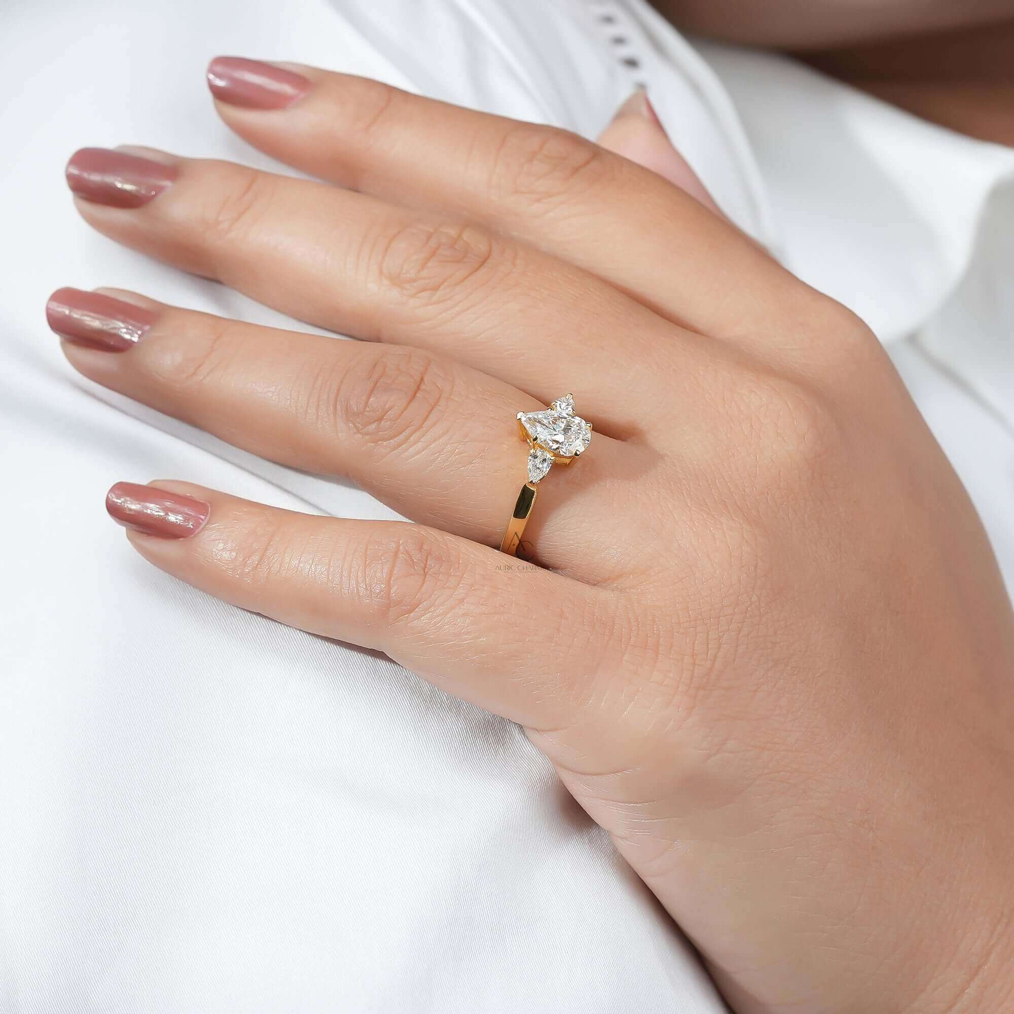 Liora Three-Stone Pear Diamond Ring in Yellow Gold