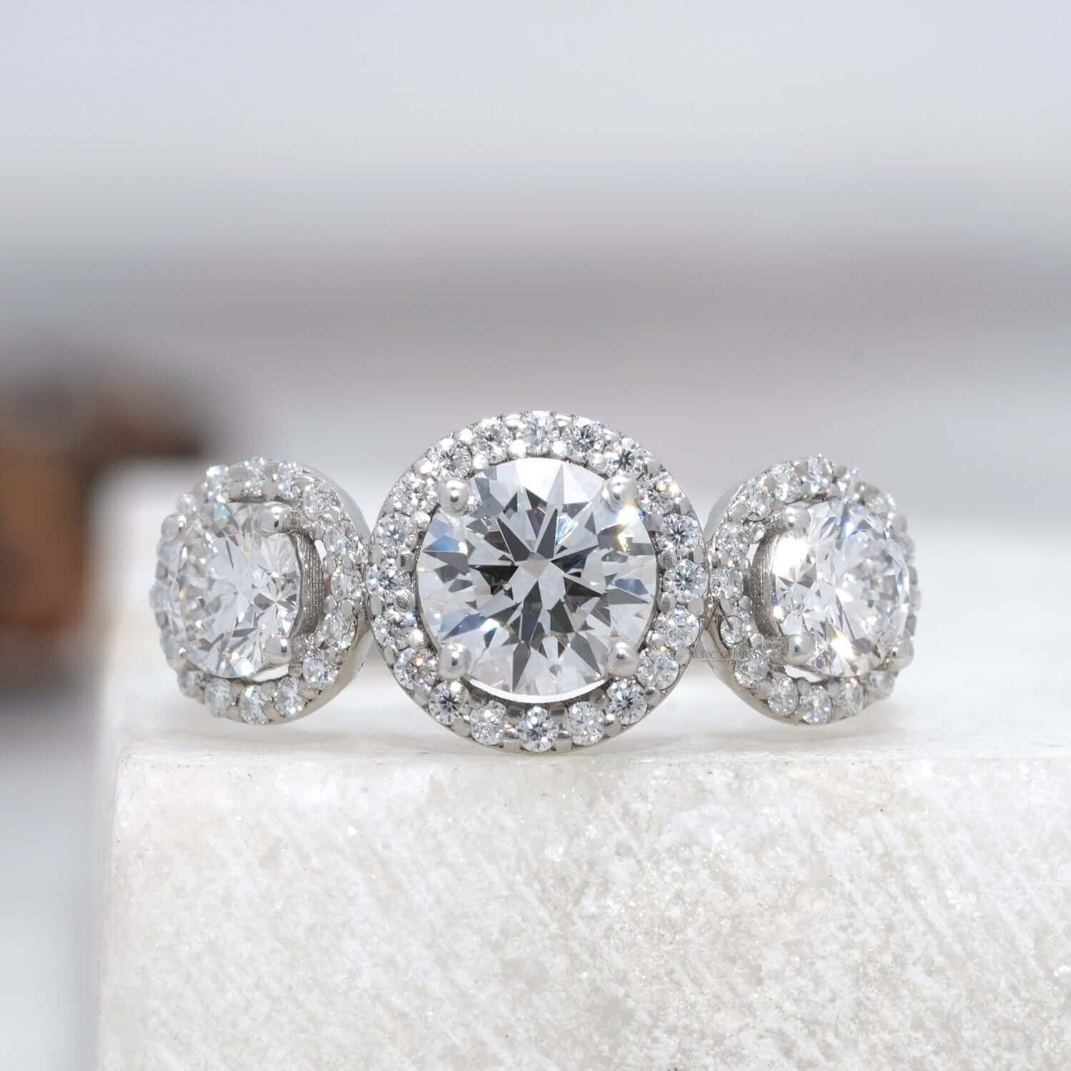 Monroe Three-Stone Halo Diamond Engagement Ring