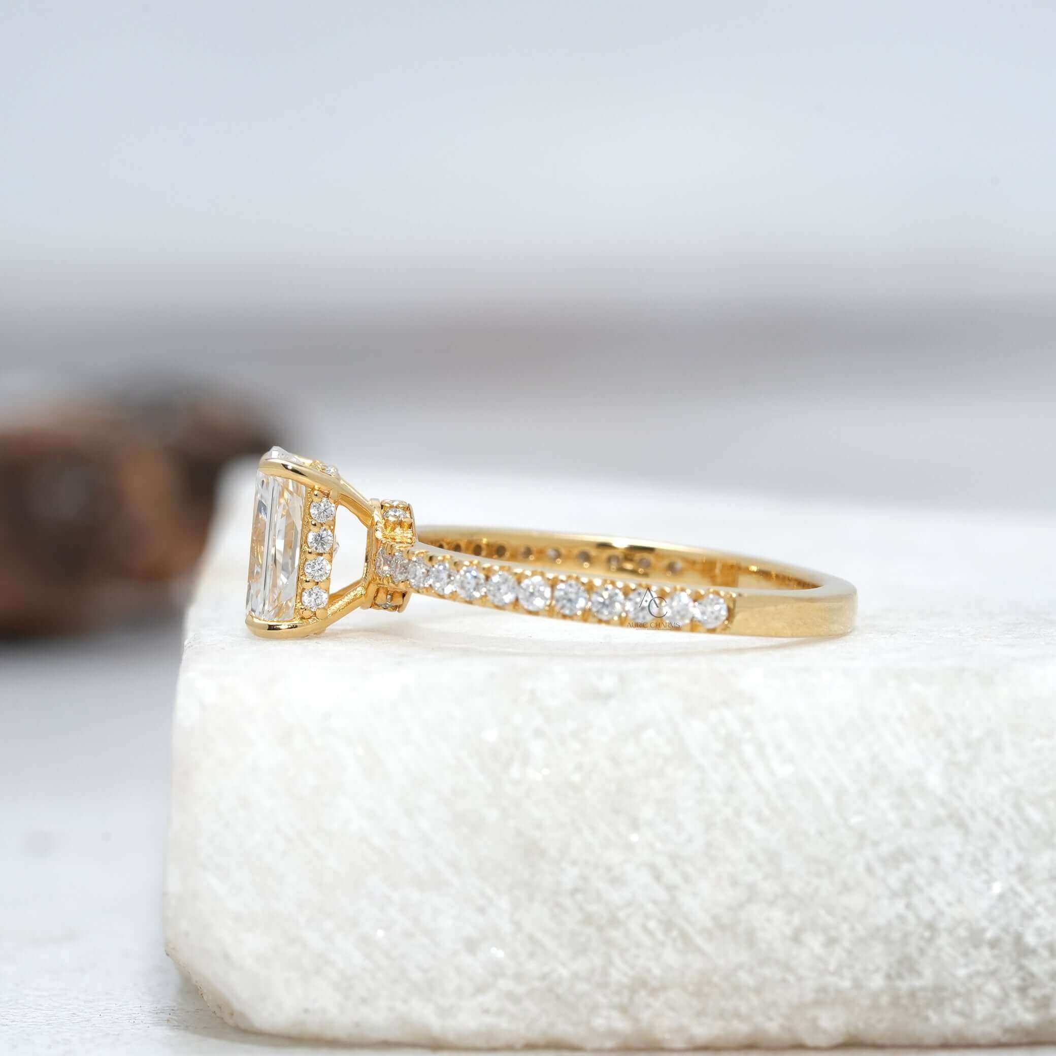 Elegant radiant diamond engagement ring featuring a slim pavé band and luxurious setting.