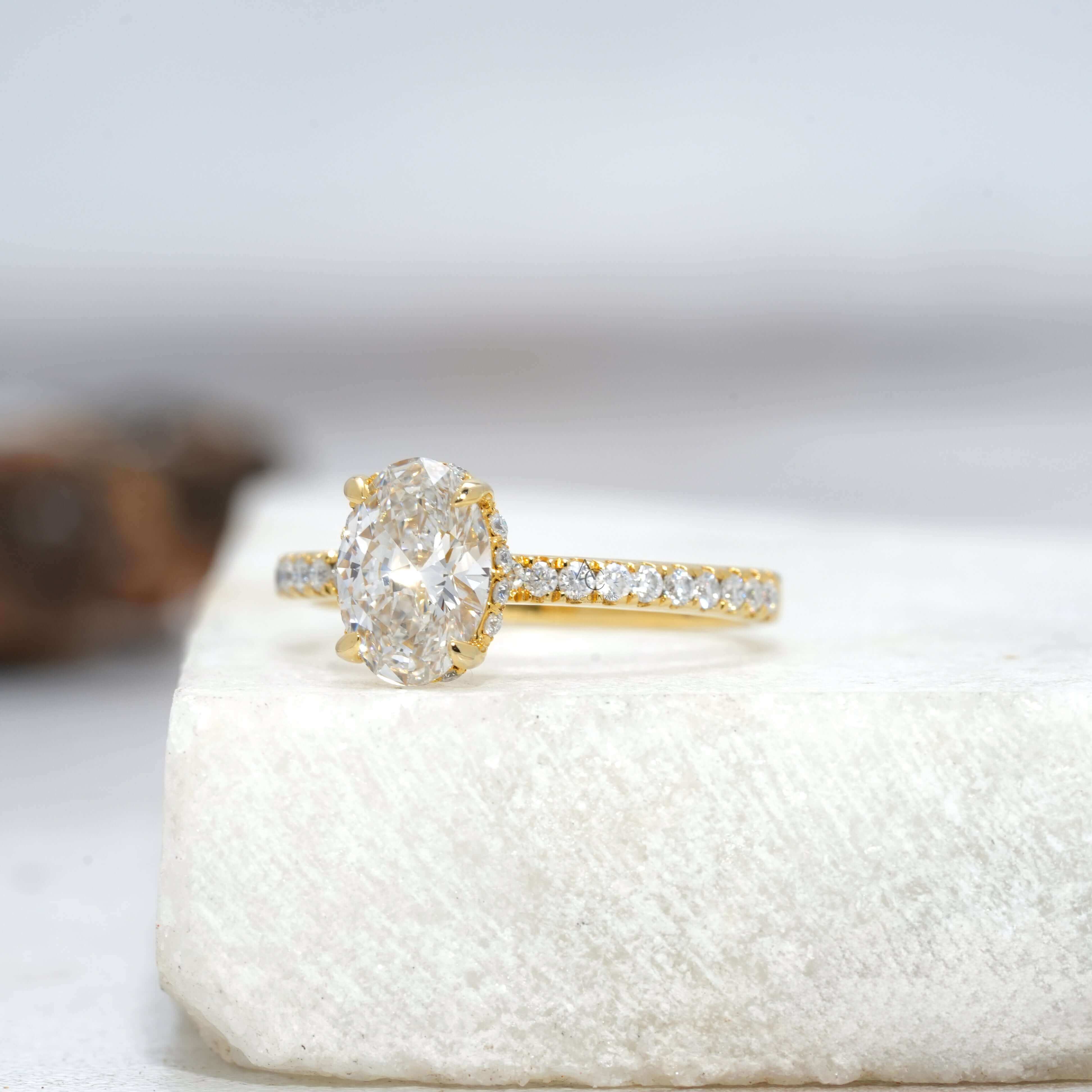 Side view of oval lab-grown diamond ring highlighting the band and secure prong setting.