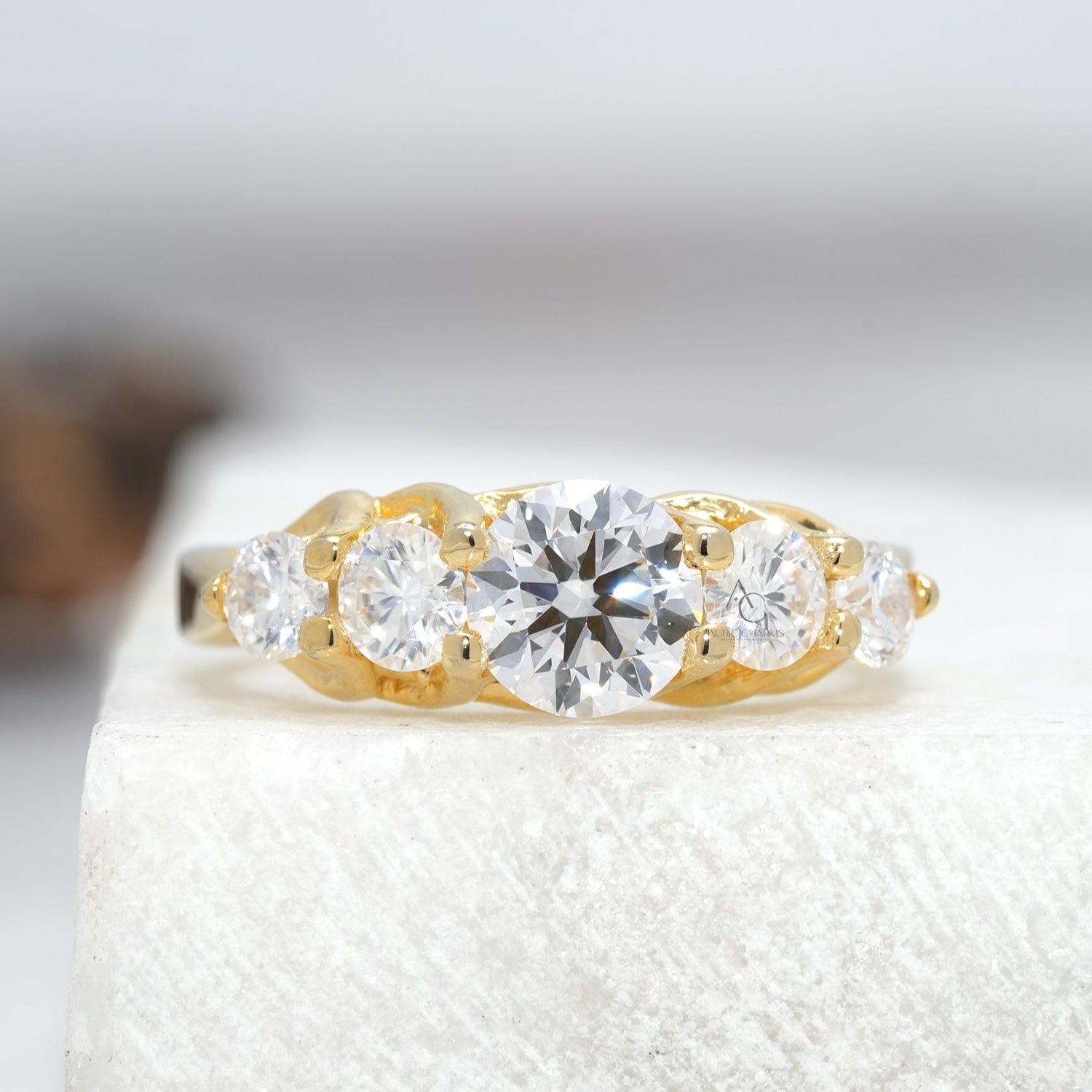 Exquisite lab-grown diamond ring featuring three round-cut diamonds on a platinum band.