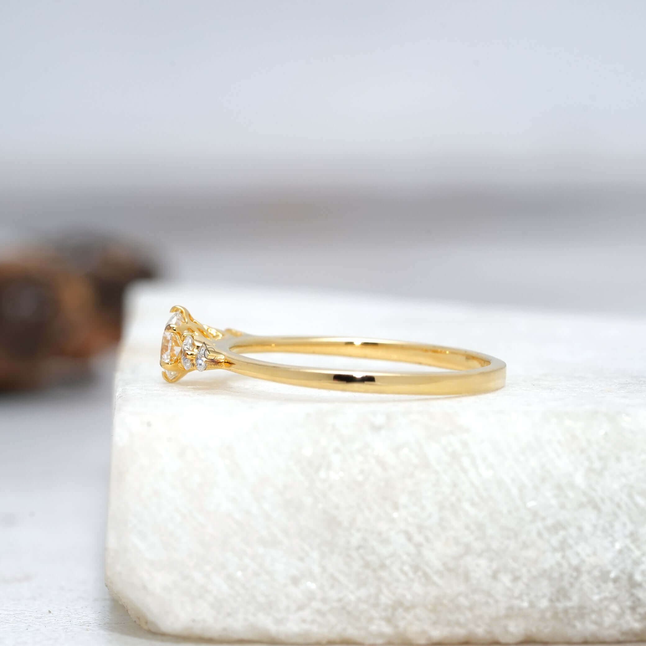 side view of a minimalist diamond solitaire ring, showcasing precision craftsmanship and timeless style.