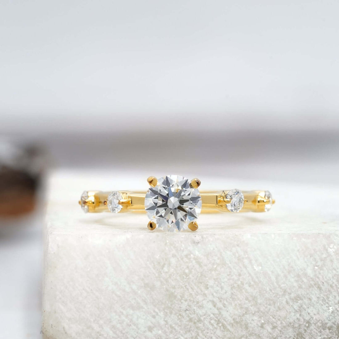 Round-cut diamond ring in white gold with reflective brilliance and sleek design.