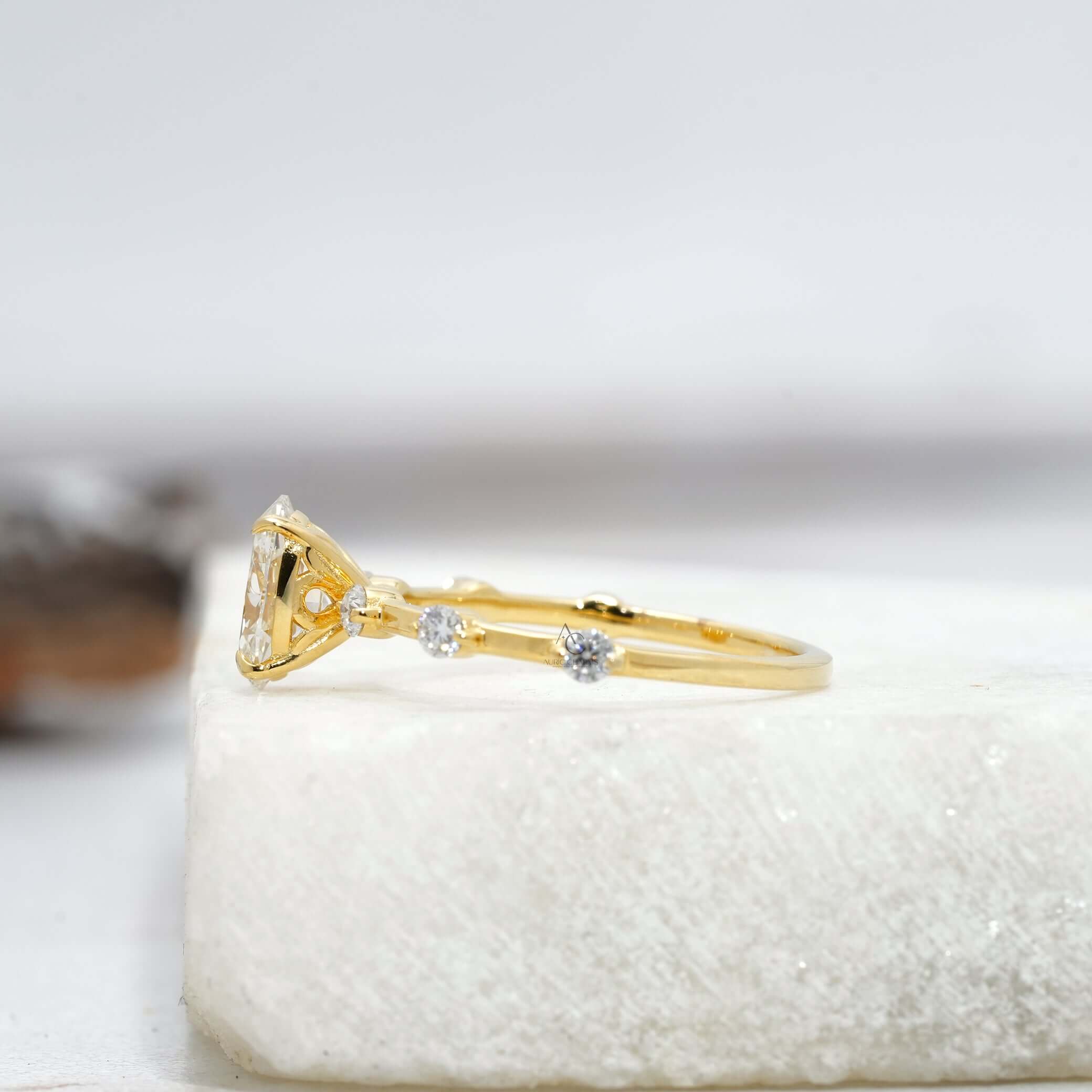 Elegant oval diamond engagement ring with shimmering accents, perfect for special occasions.
