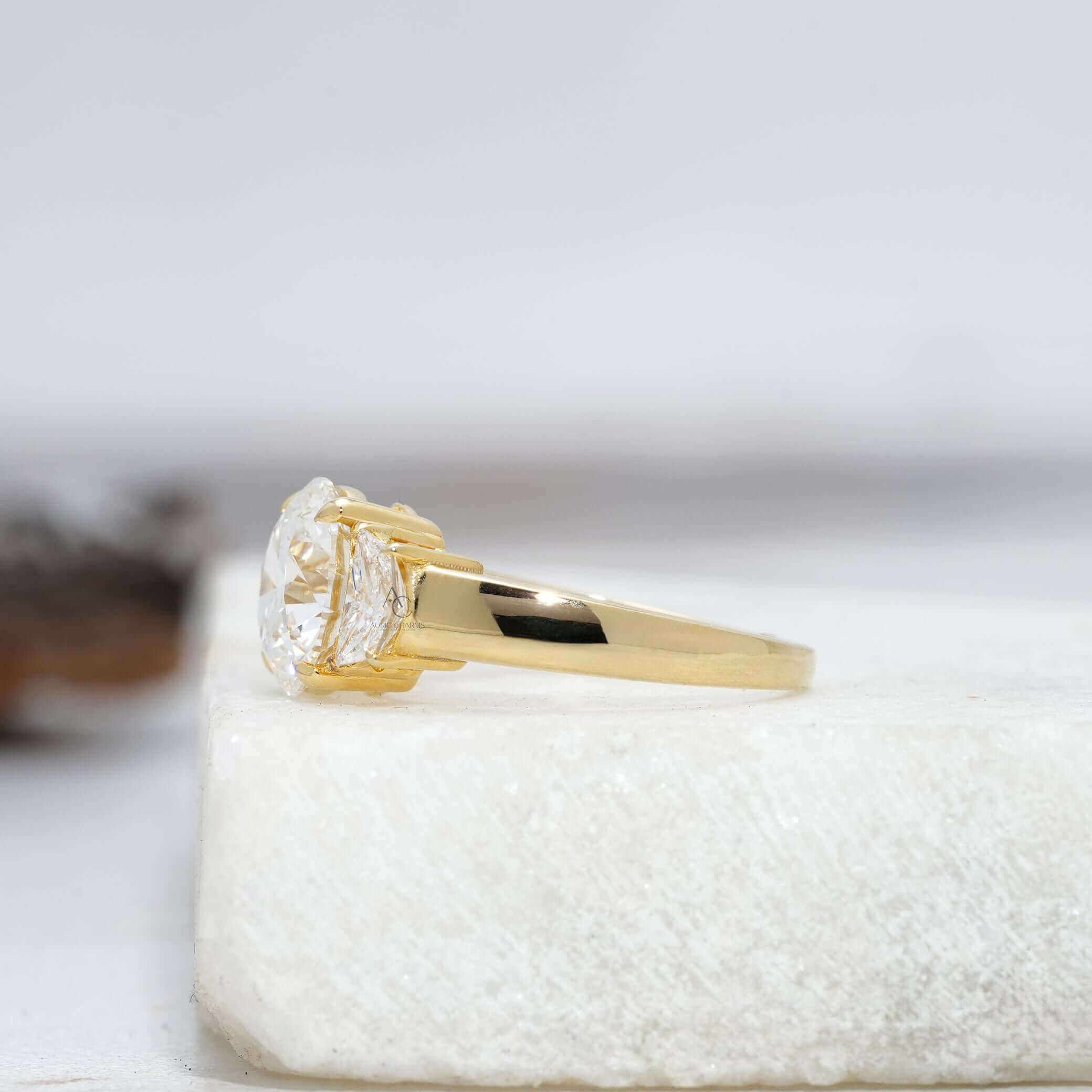 Side view of round brilliant diamond ring showcasing symmetry.