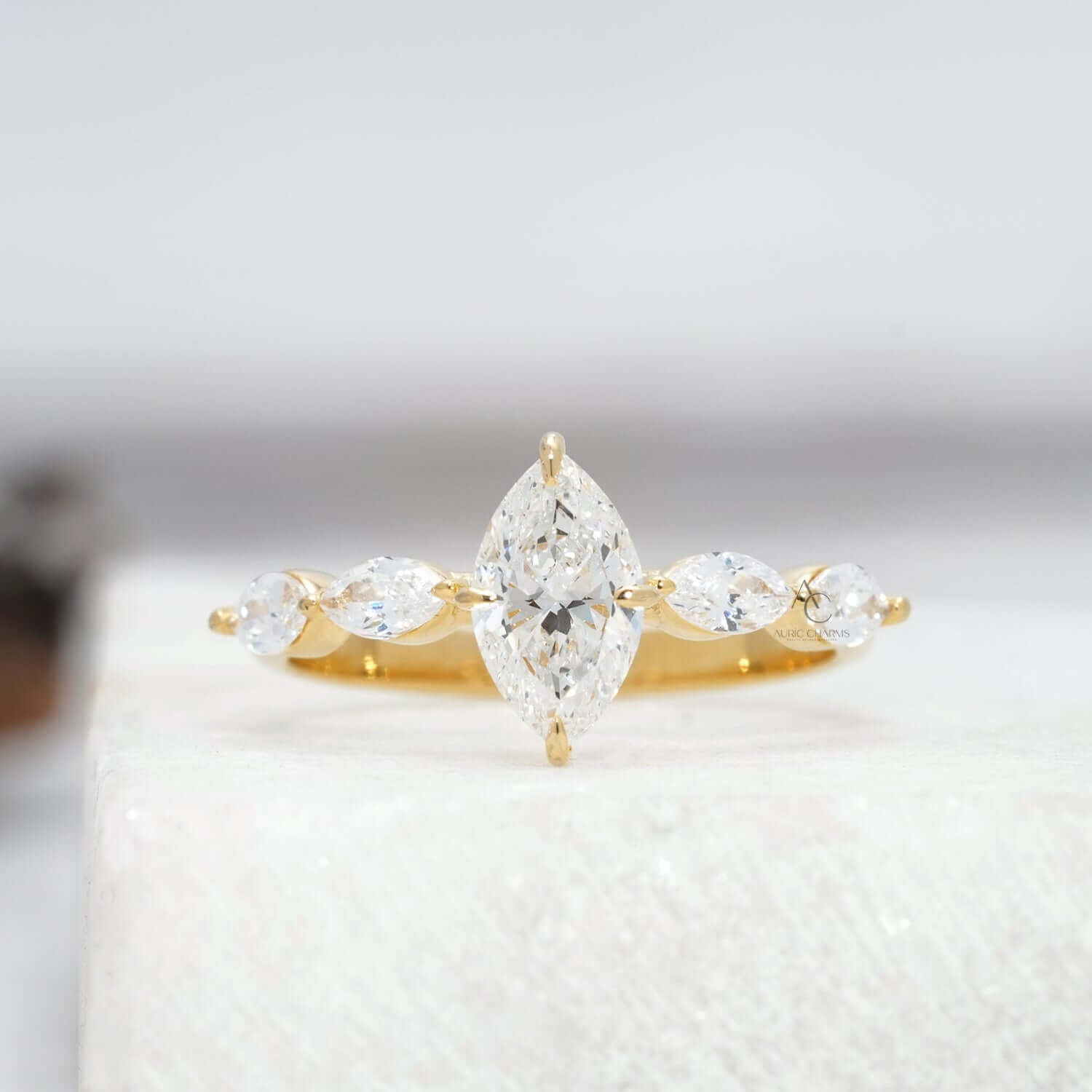 Marquise-cut diamond ring, highlighting sparkle and design.