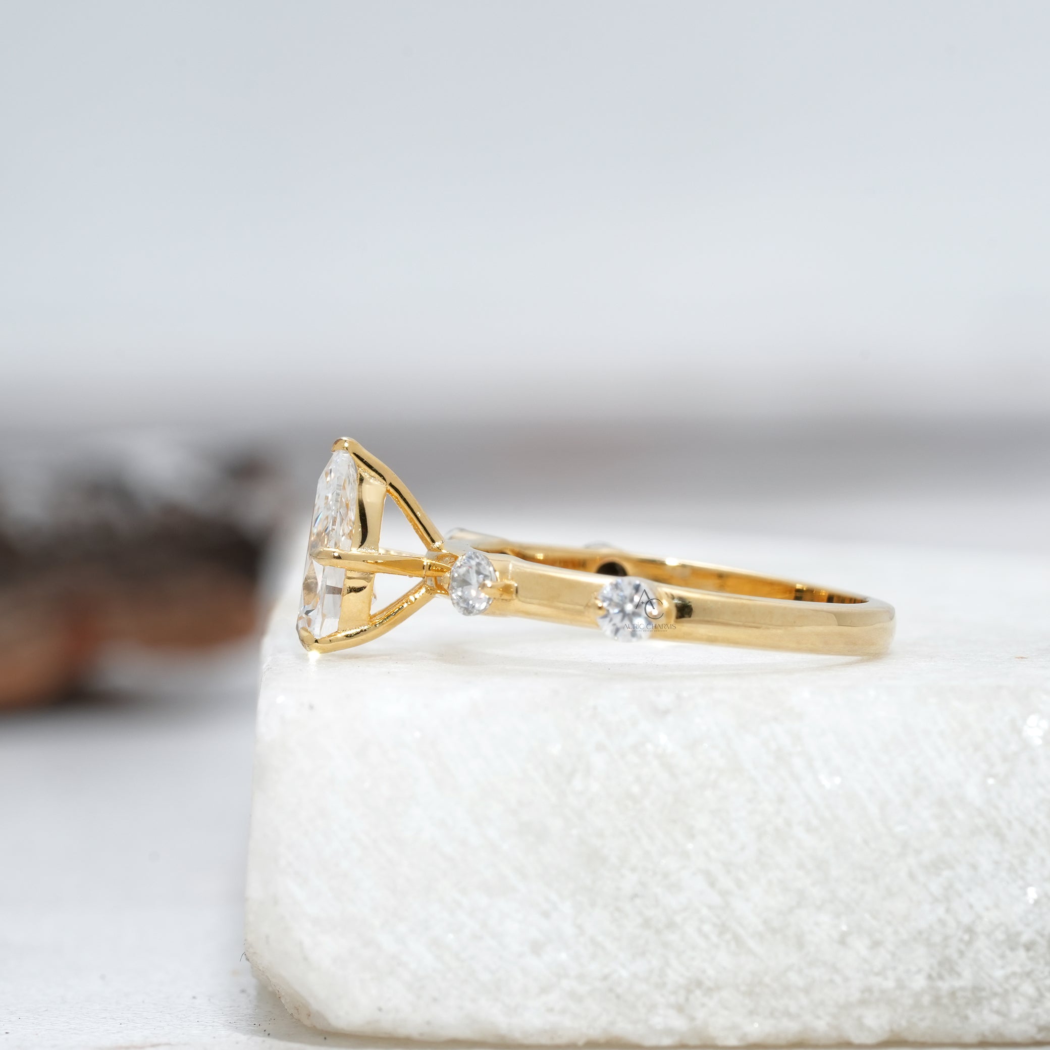 Elegant pear-shaped diamond ring with a minimalist band, showcasing sustainable lab-grown diamond brilliance.