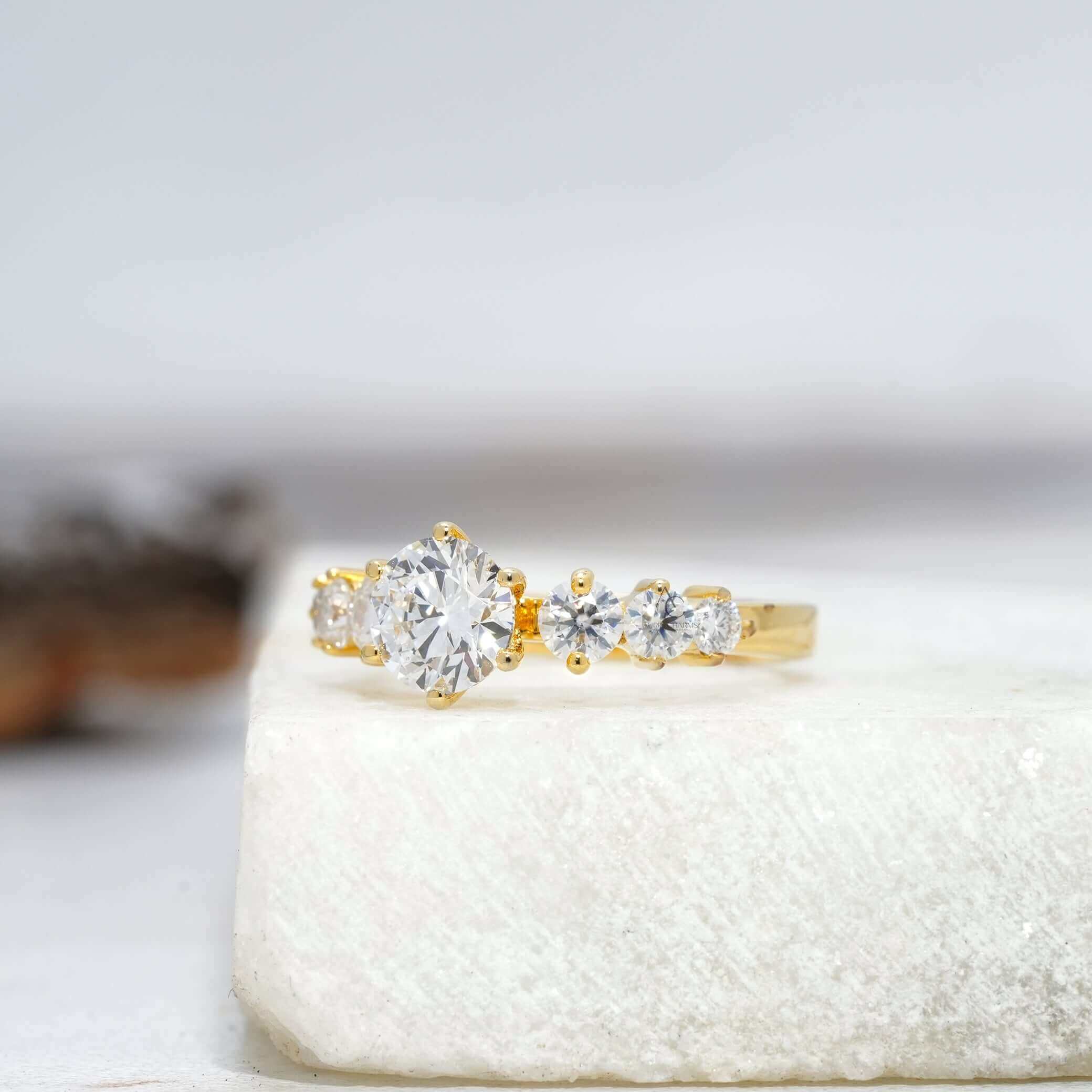 Elegant diamond engagement ring featuring a round-cut center stone with side brilliance.