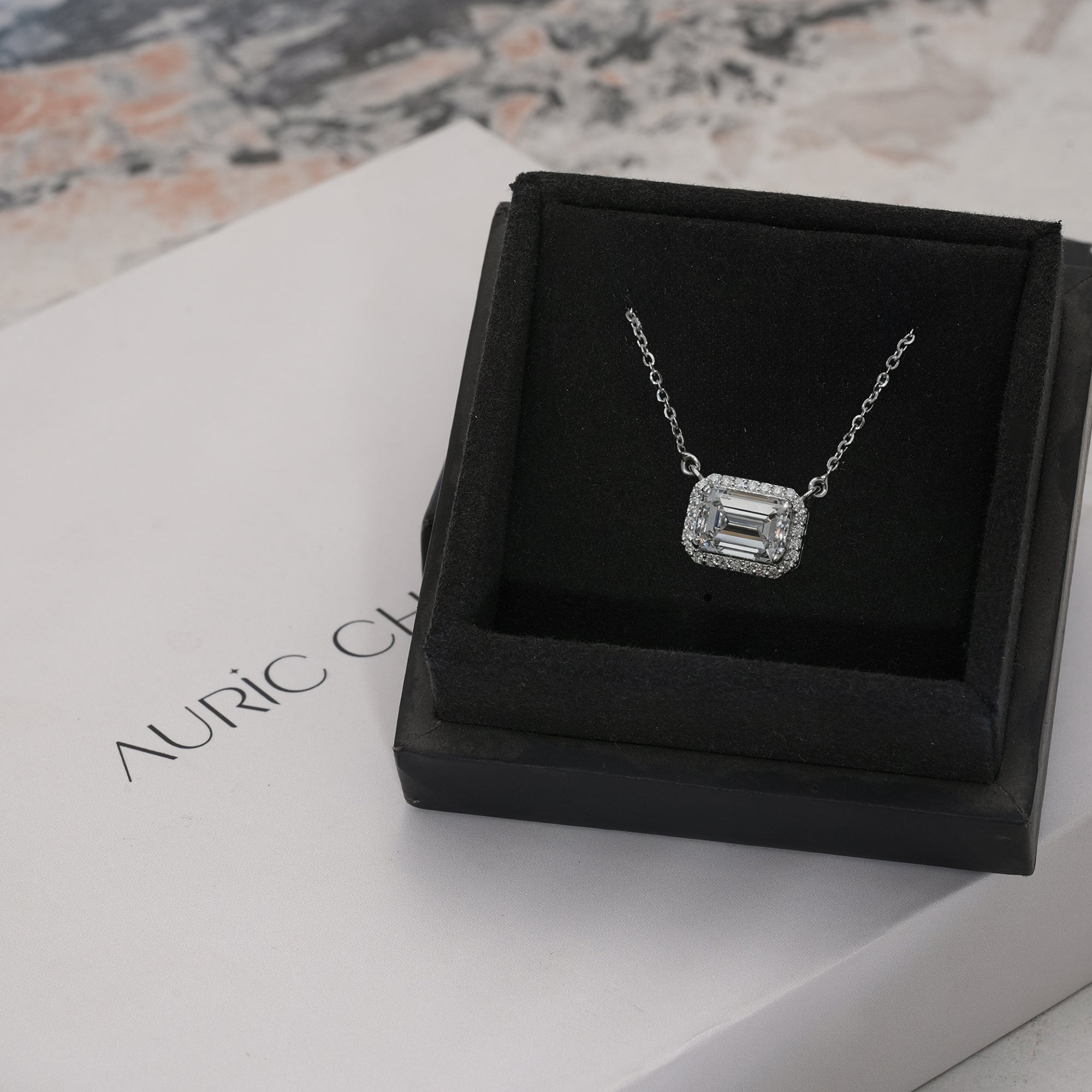 Zendaya Emerald East-West Halo Diamond Pendant