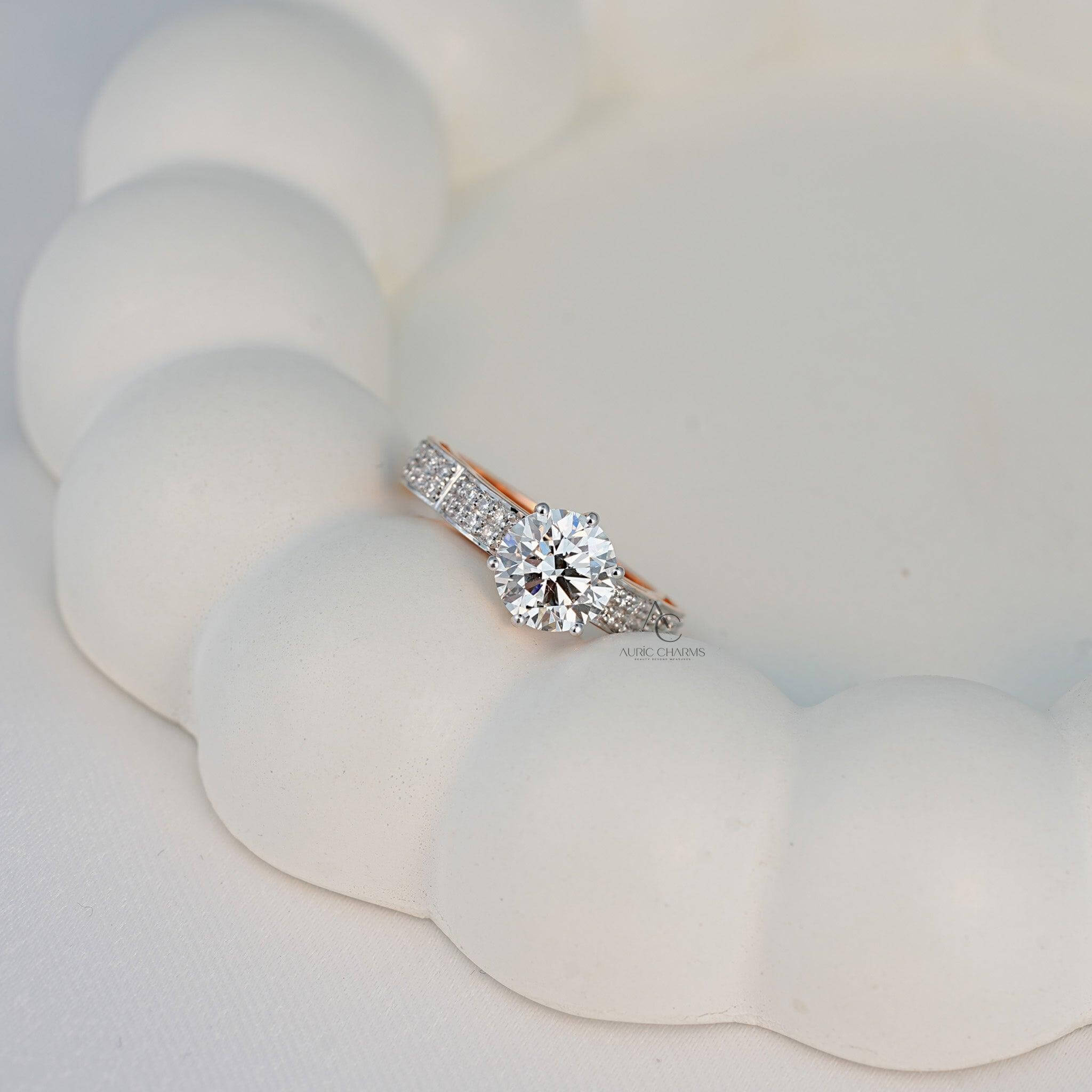 Diamond solitaire ring on display with a soft background.