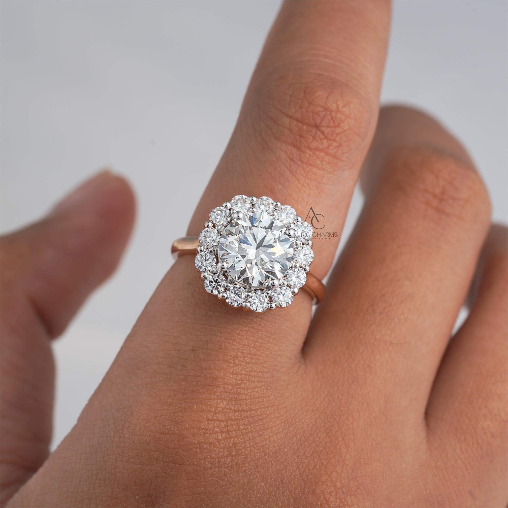 Round-cut halo diamond engagement ring in rose gold setting, featuring a radiant sparkle.