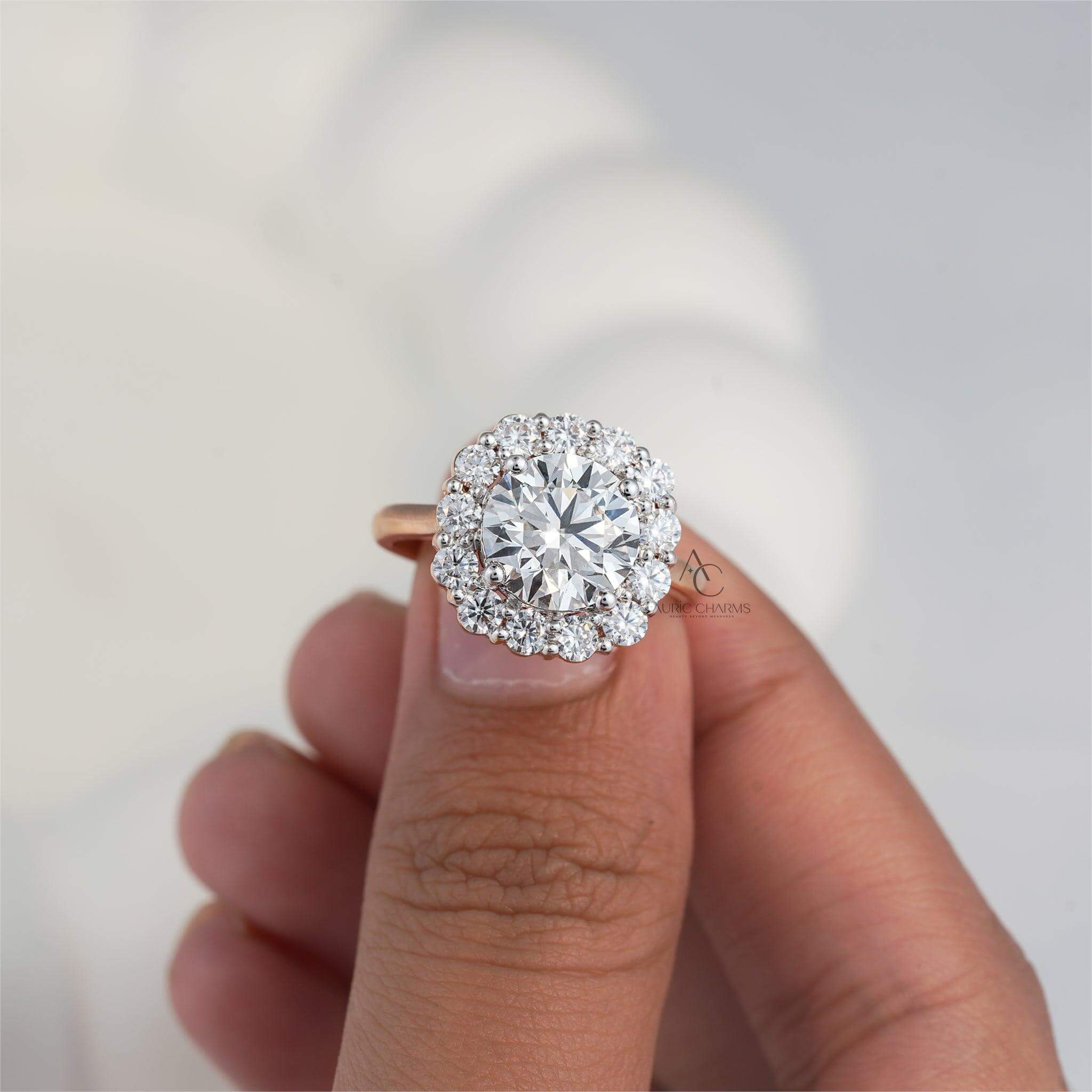 Rose gold round halo diamond ring held between fingers, perfect for elegant proposals.