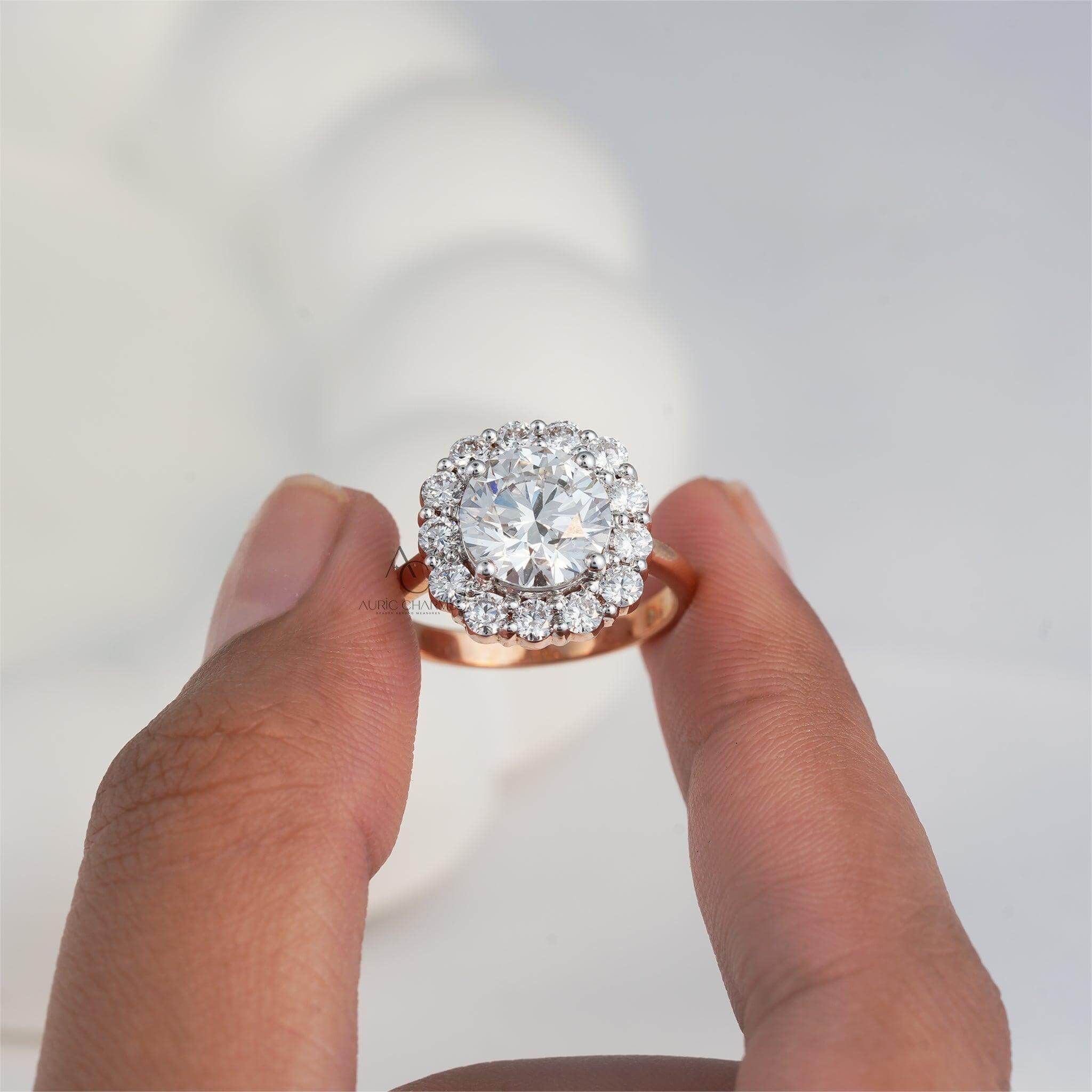 Dazzling diamond ring with a classic round halo design and rose gold craftsmanship.