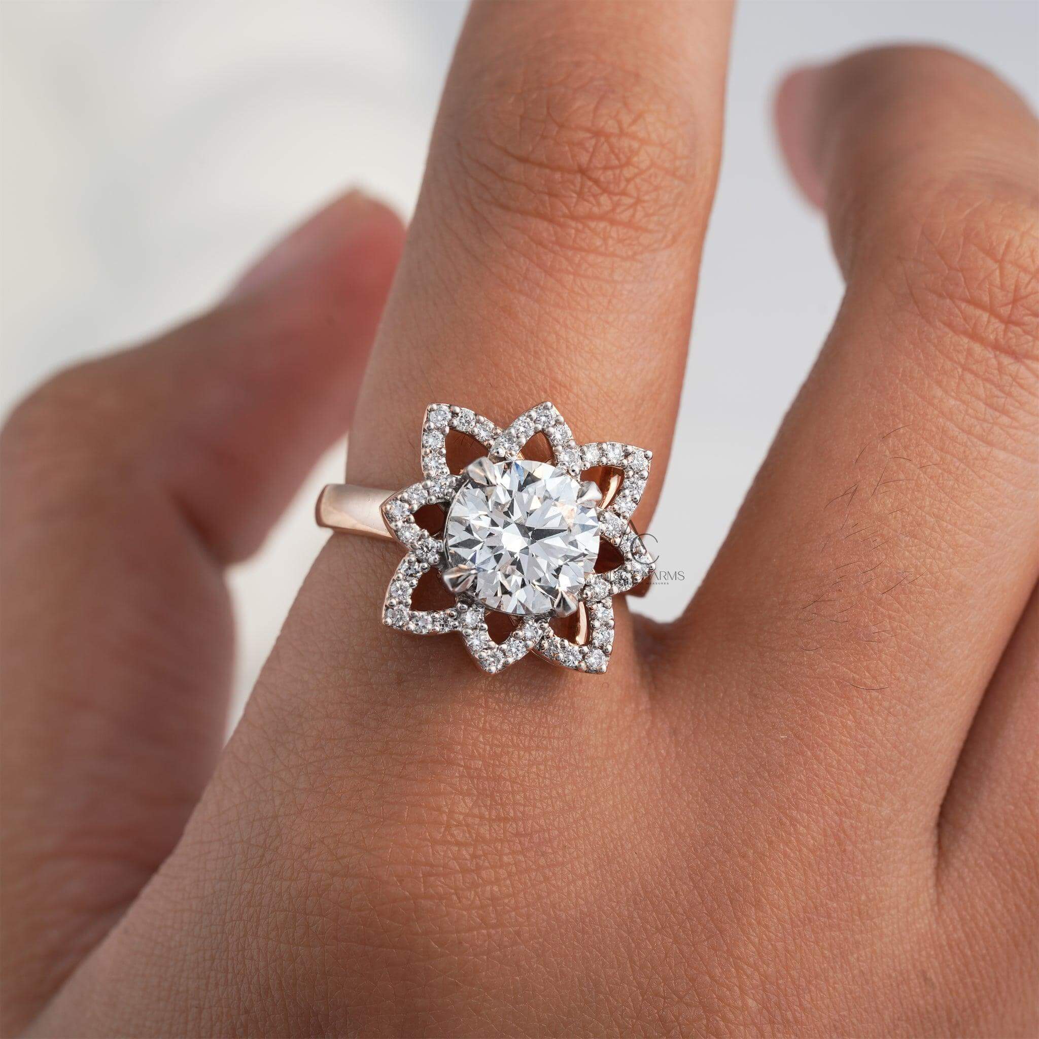 ose gold ring with a floral diamond halo and lab-grown round-cut diamond center