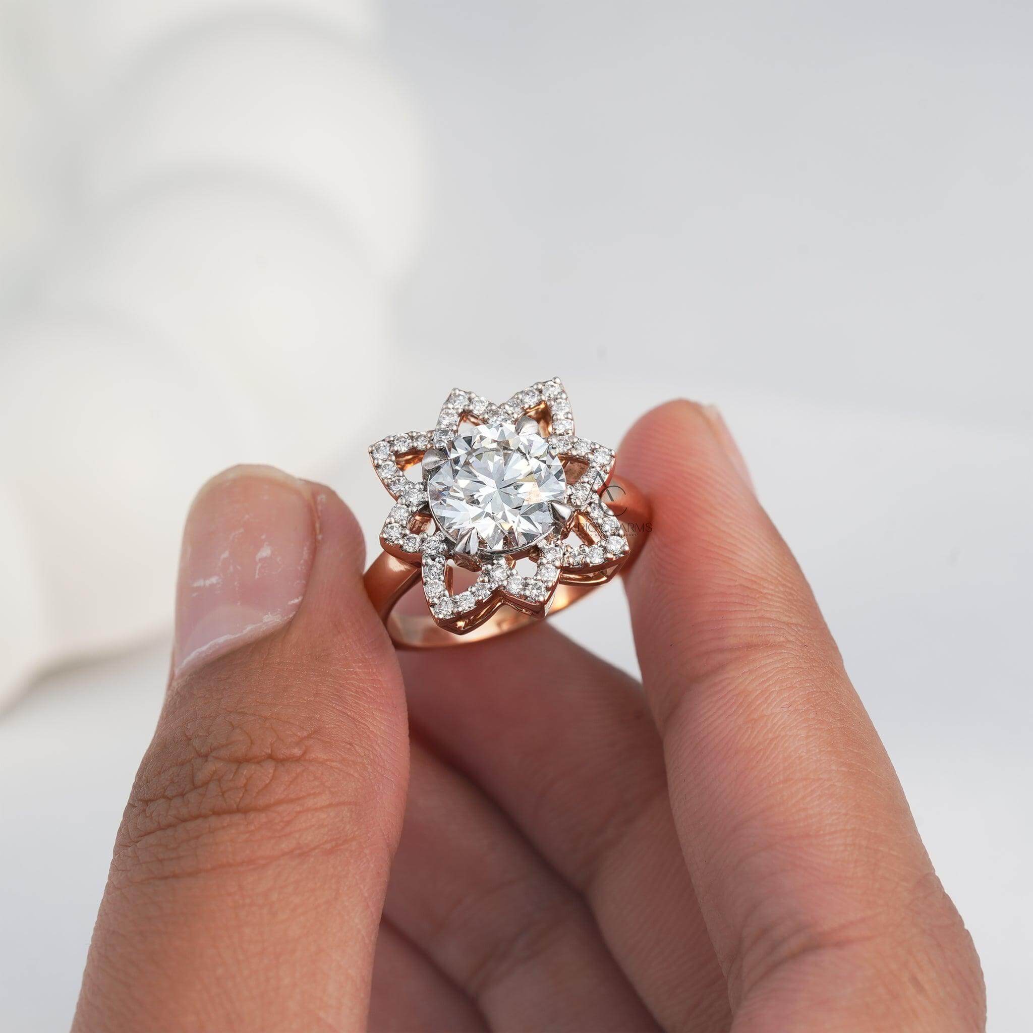 Floral rose gold ring with a stunning lab-grown diamond centerpiece and halo accents.