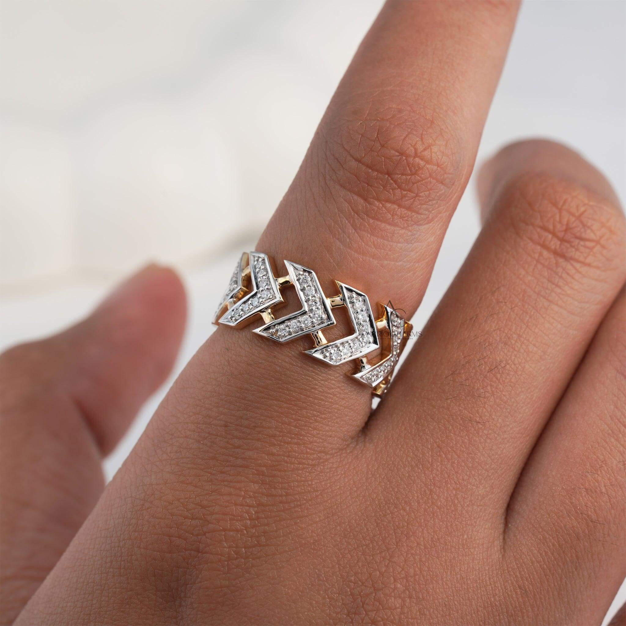 Chevron pattern diamond ring on hand featuring lab-grown diamonds.