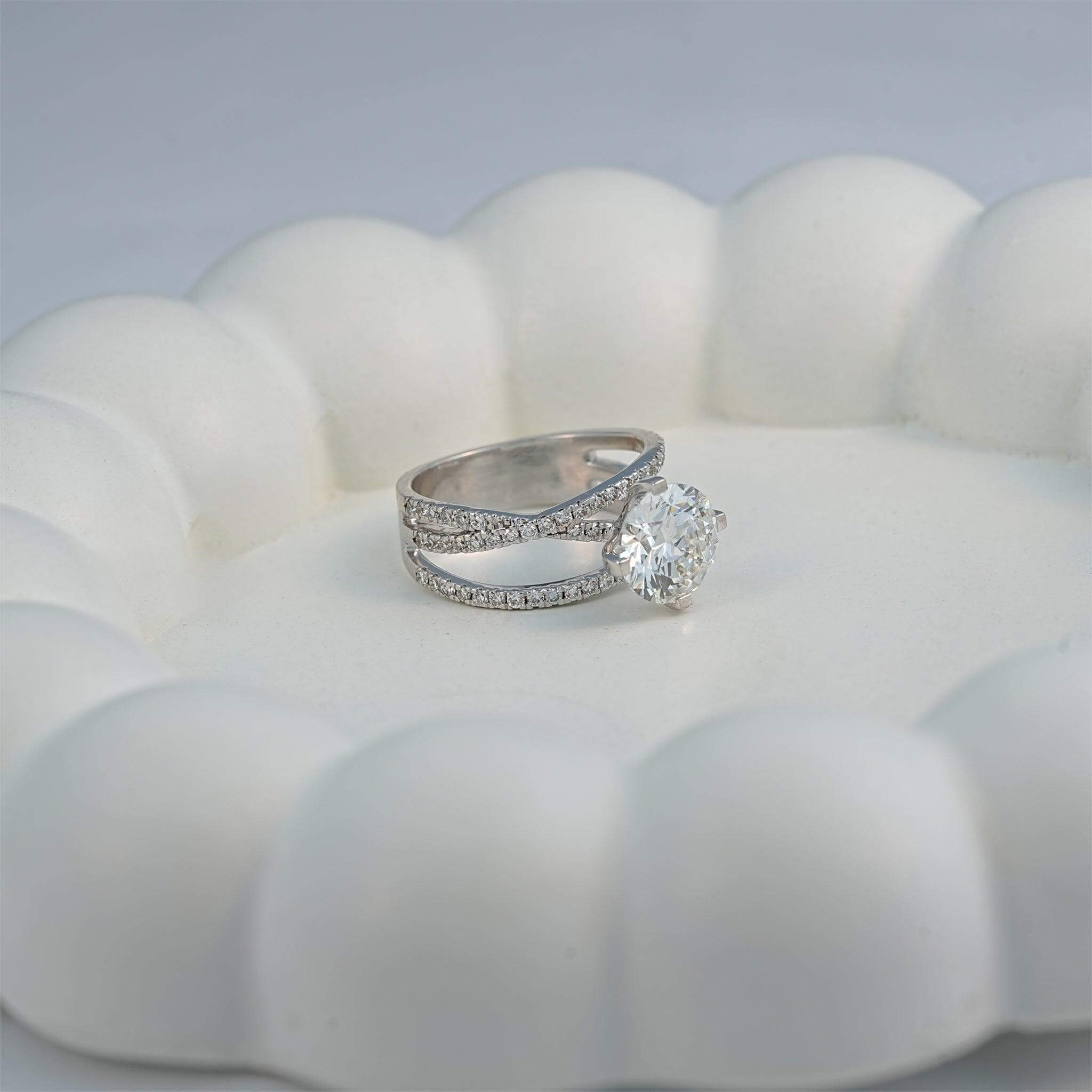 Side view of a solitaire diamond ring with a split band, ideal for romantic and contemporary styles.