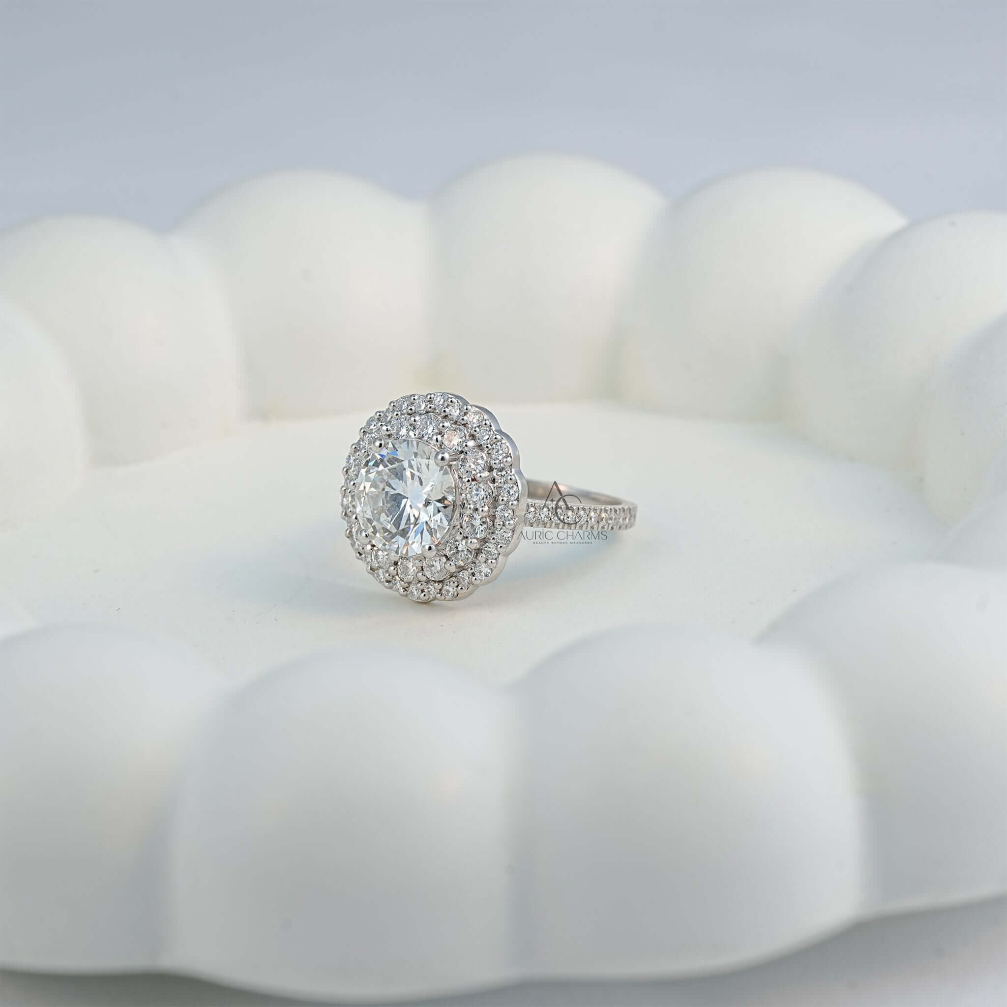 Lab-grown diamond halo ring with floral-inspired detailing on a white background.