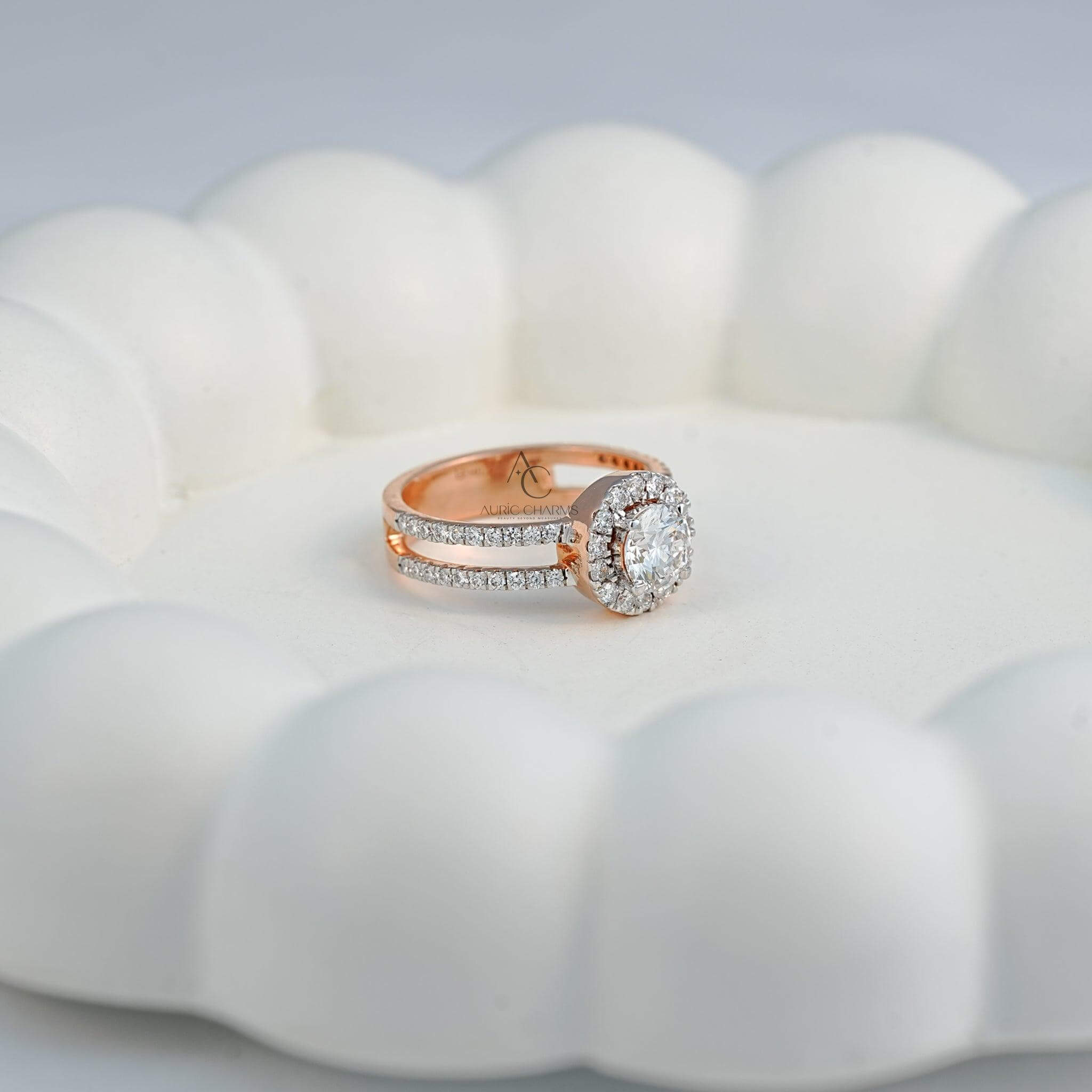 Angled view of a rose gold diamond ring with a round center stone and double halo, showcasing intricate diamond detailing along the band.