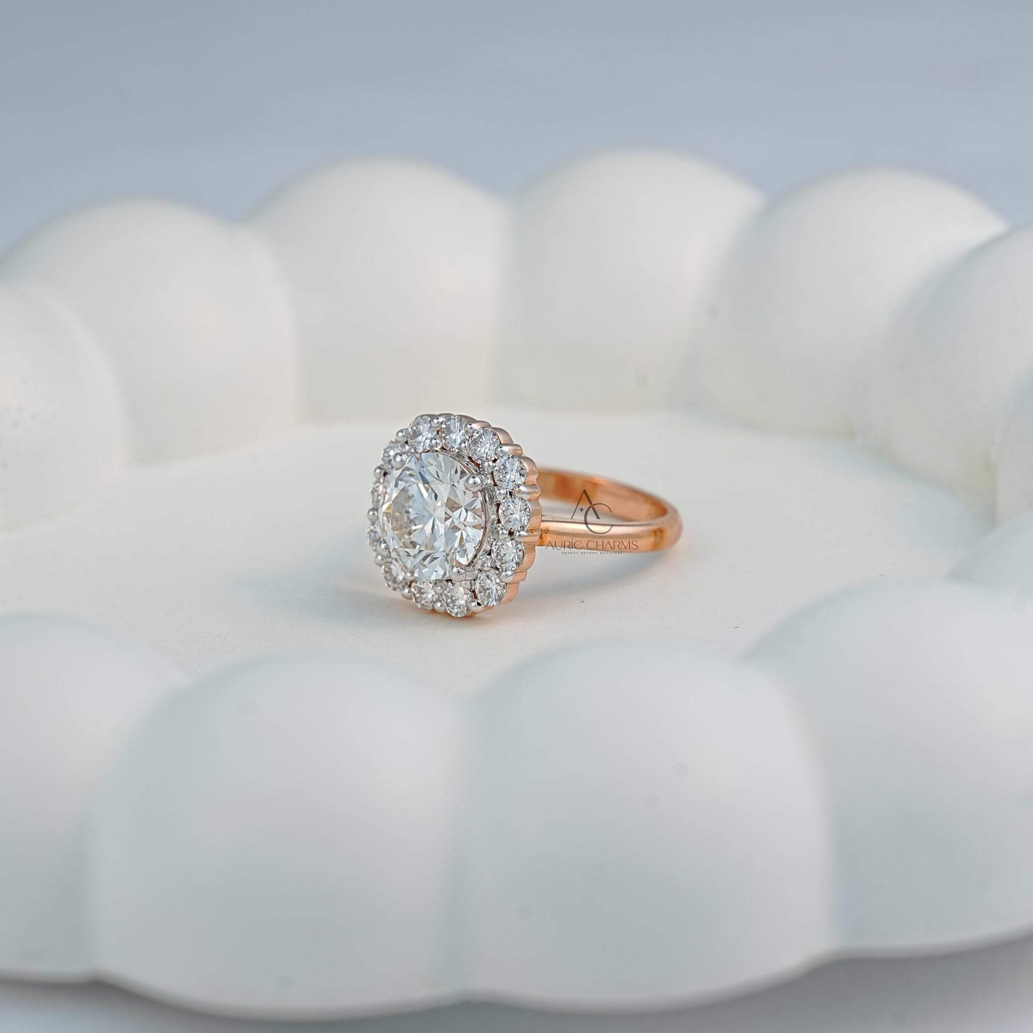 Round-cut diamond halo ring side view, showing intricate detailing and timeless elegance.