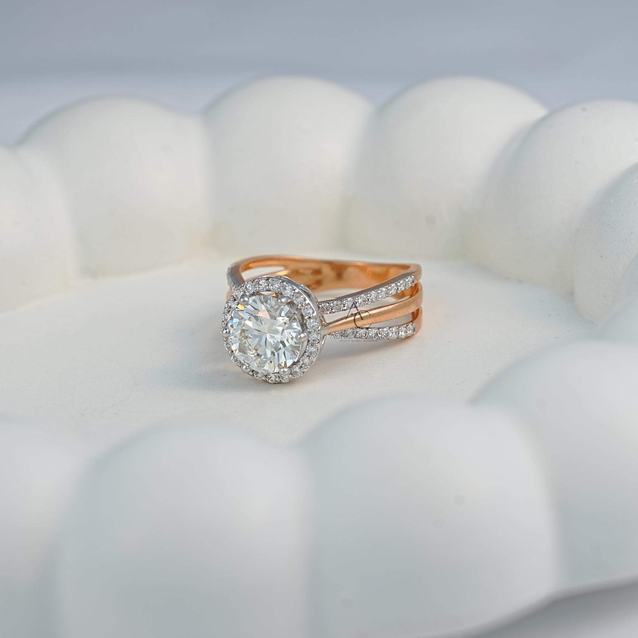 Side view of round halo diamond engagement ring in rose gold, intricate craftsmanship.